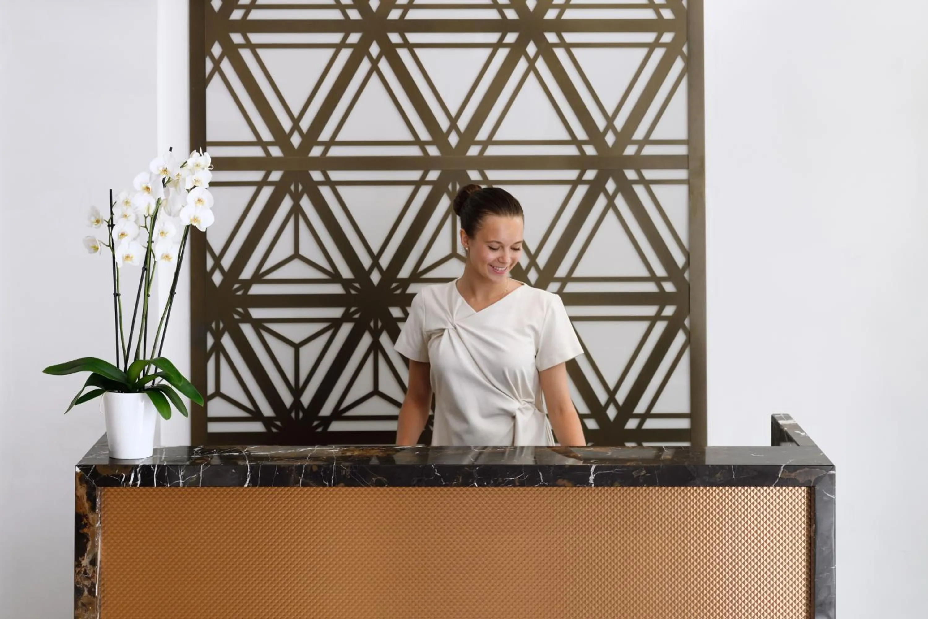 Staff in Columbus Hotel Monte-Carlo, Curio Collection by Hilton