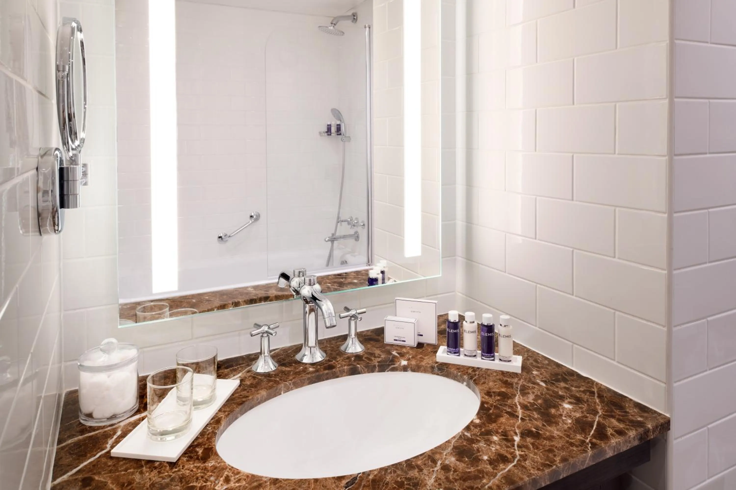 Shower in Columbus Hotel Monte-Carlo, Curio Collection by Hilton