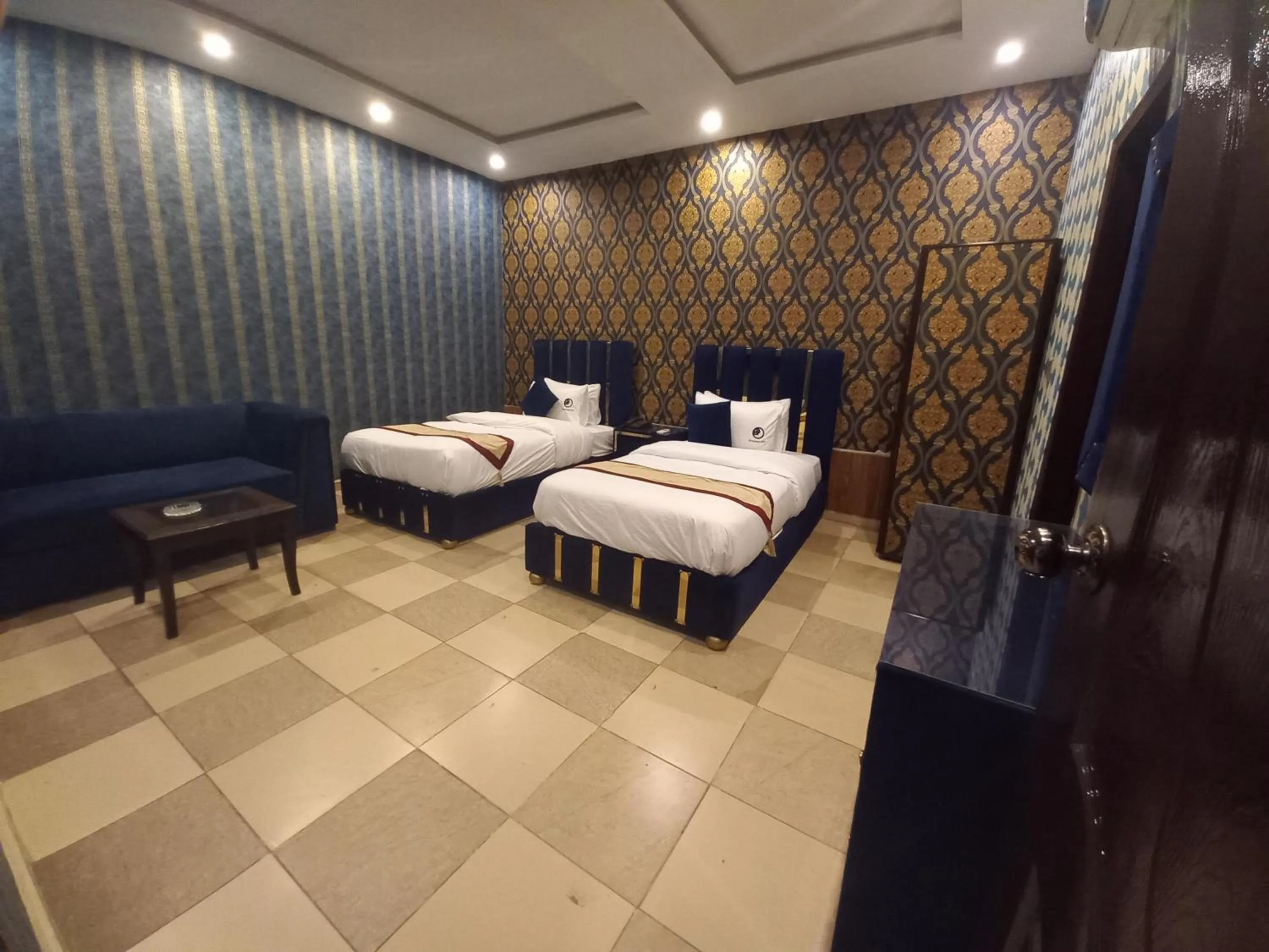 Property building, Bed in Premier Inn Johar Town Lahore
