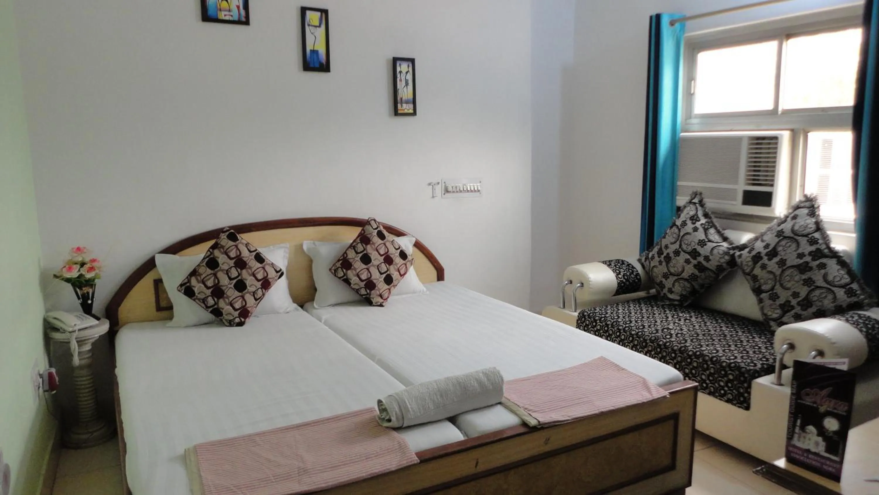 Bed in Hotel Swarajya Palace