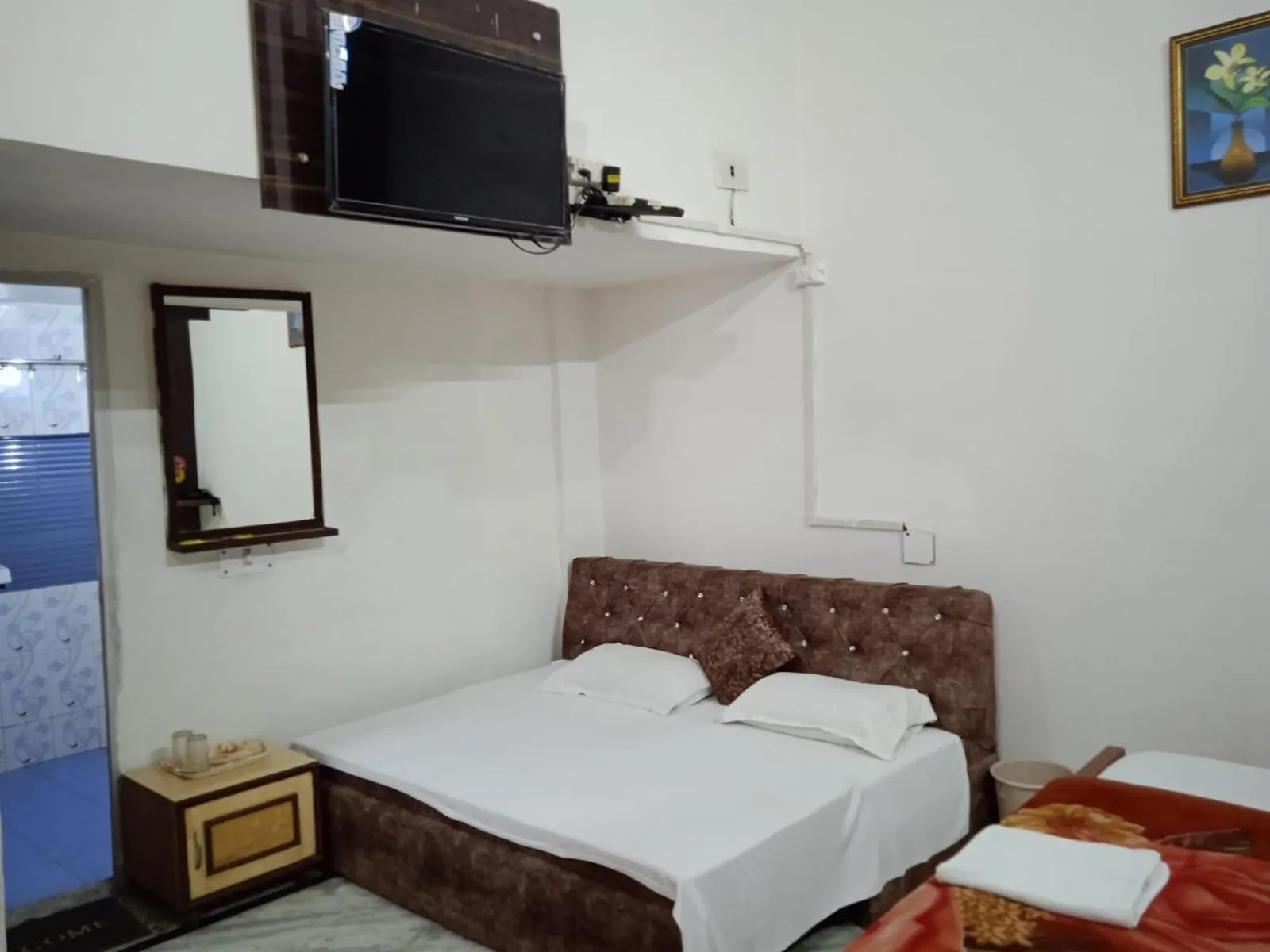 Bed in Hotel Swarajya Palace