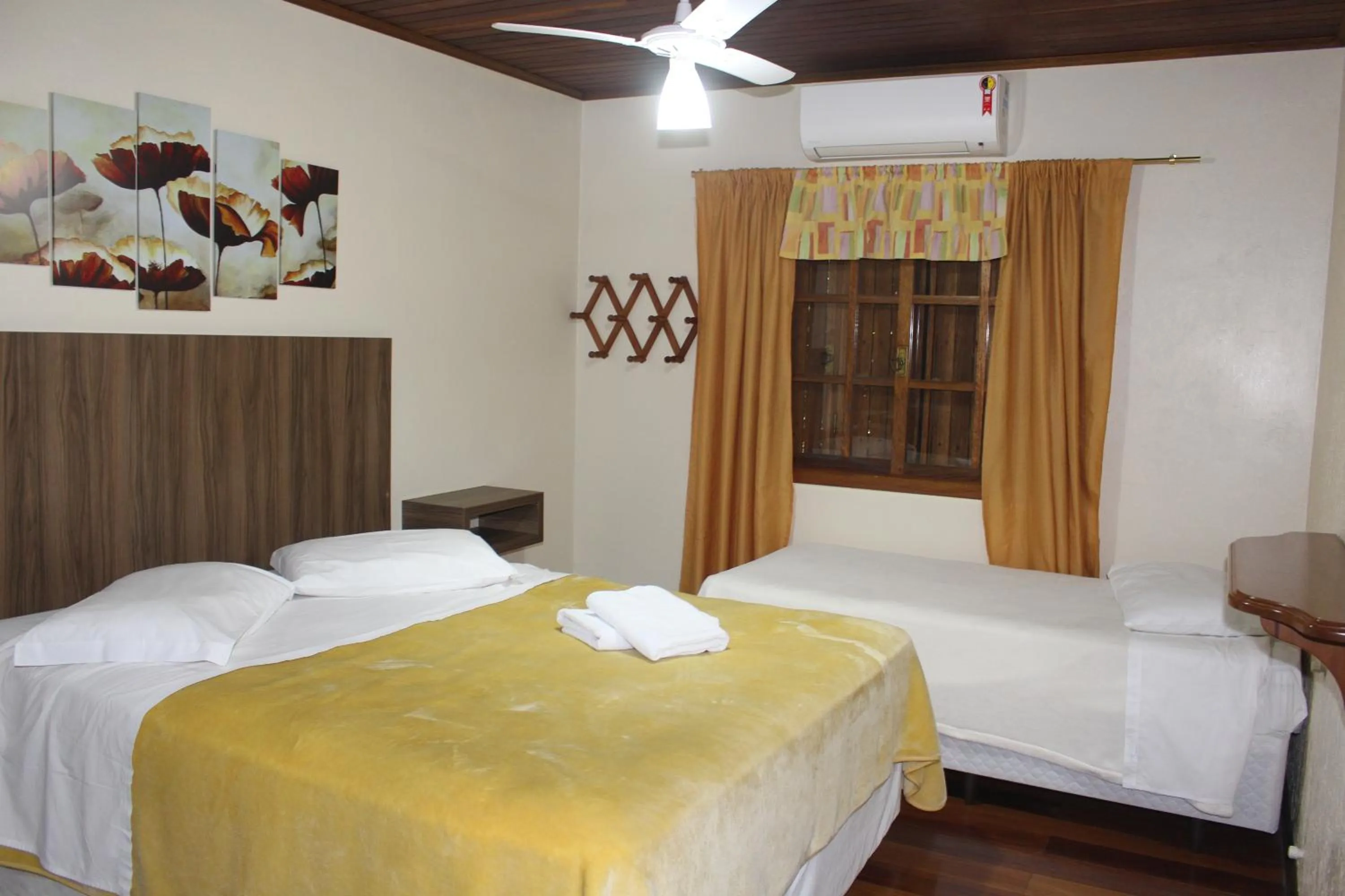 Bedroom in Pousada Floresta Negra