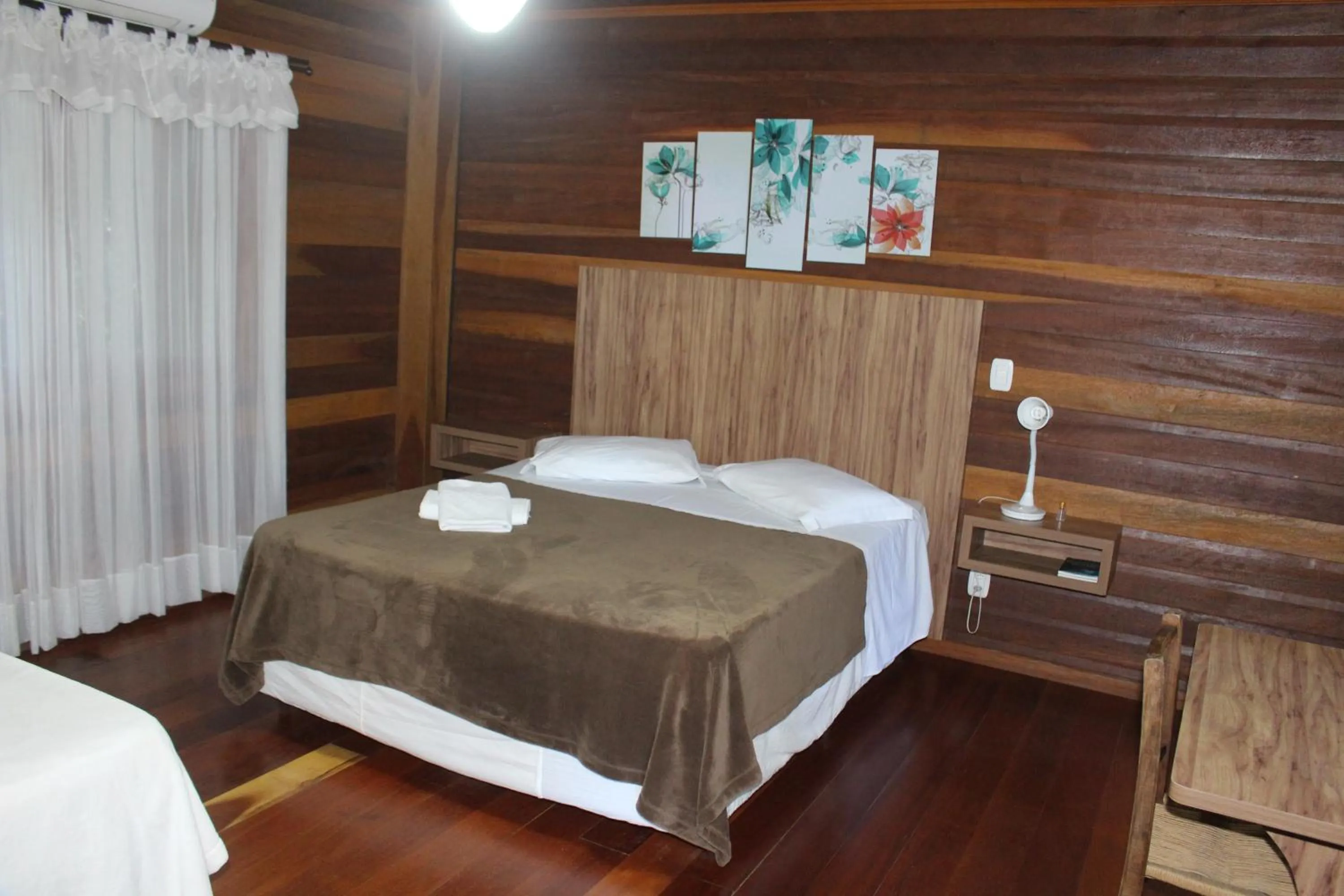 Bedroom in Pousada Floresta Negra