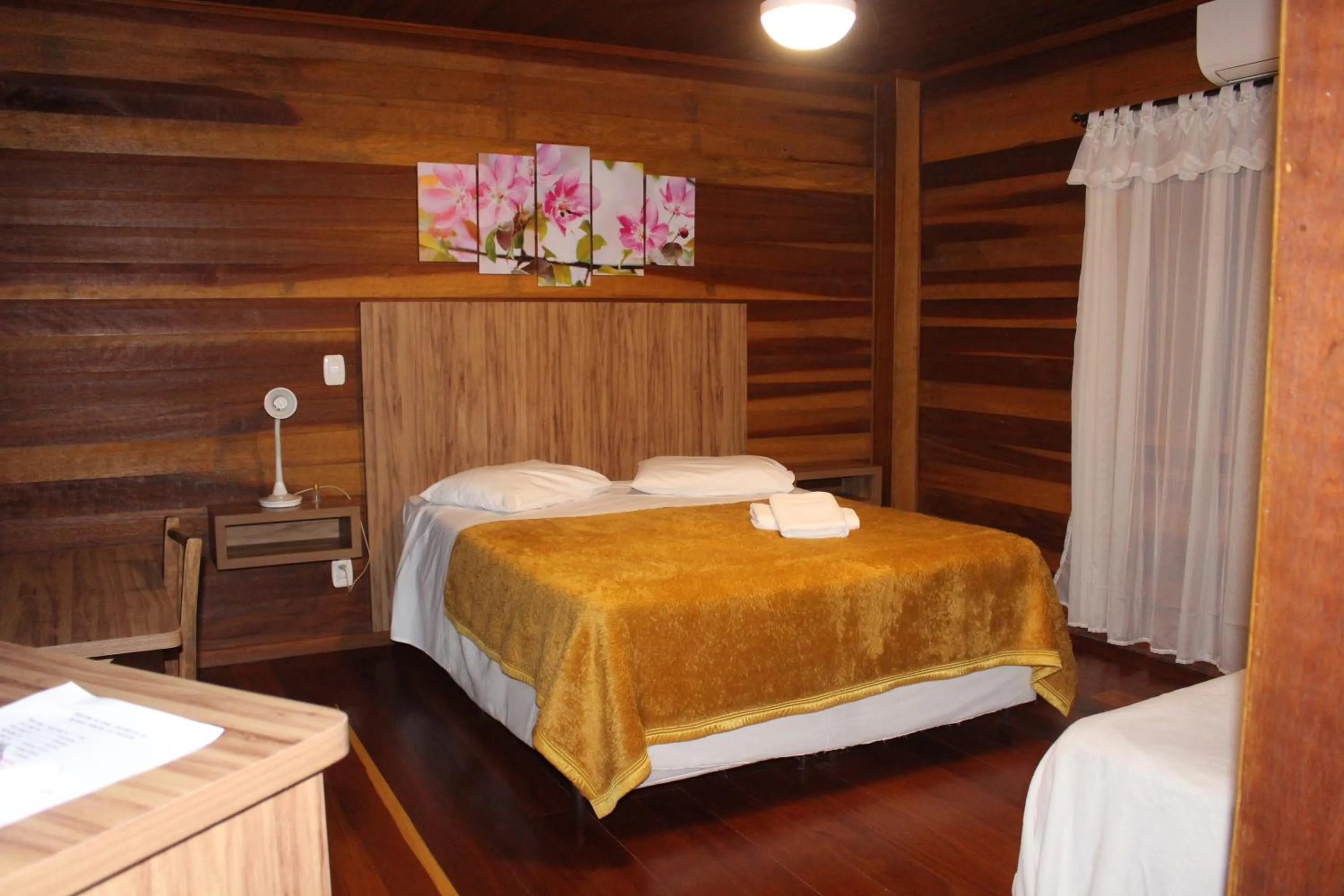 Bedroom in Pousada Floresta Negra