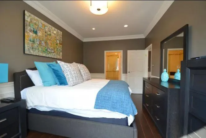 Bed in The SoMa Furnished Residences