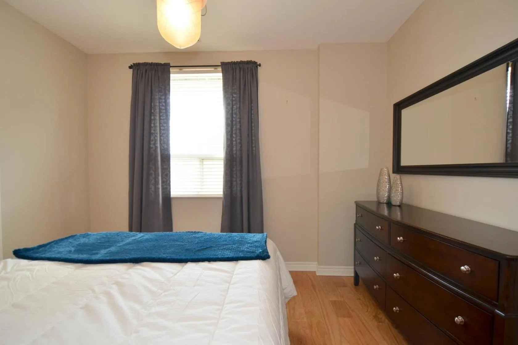 Bed in The SoMa Furnished Residences