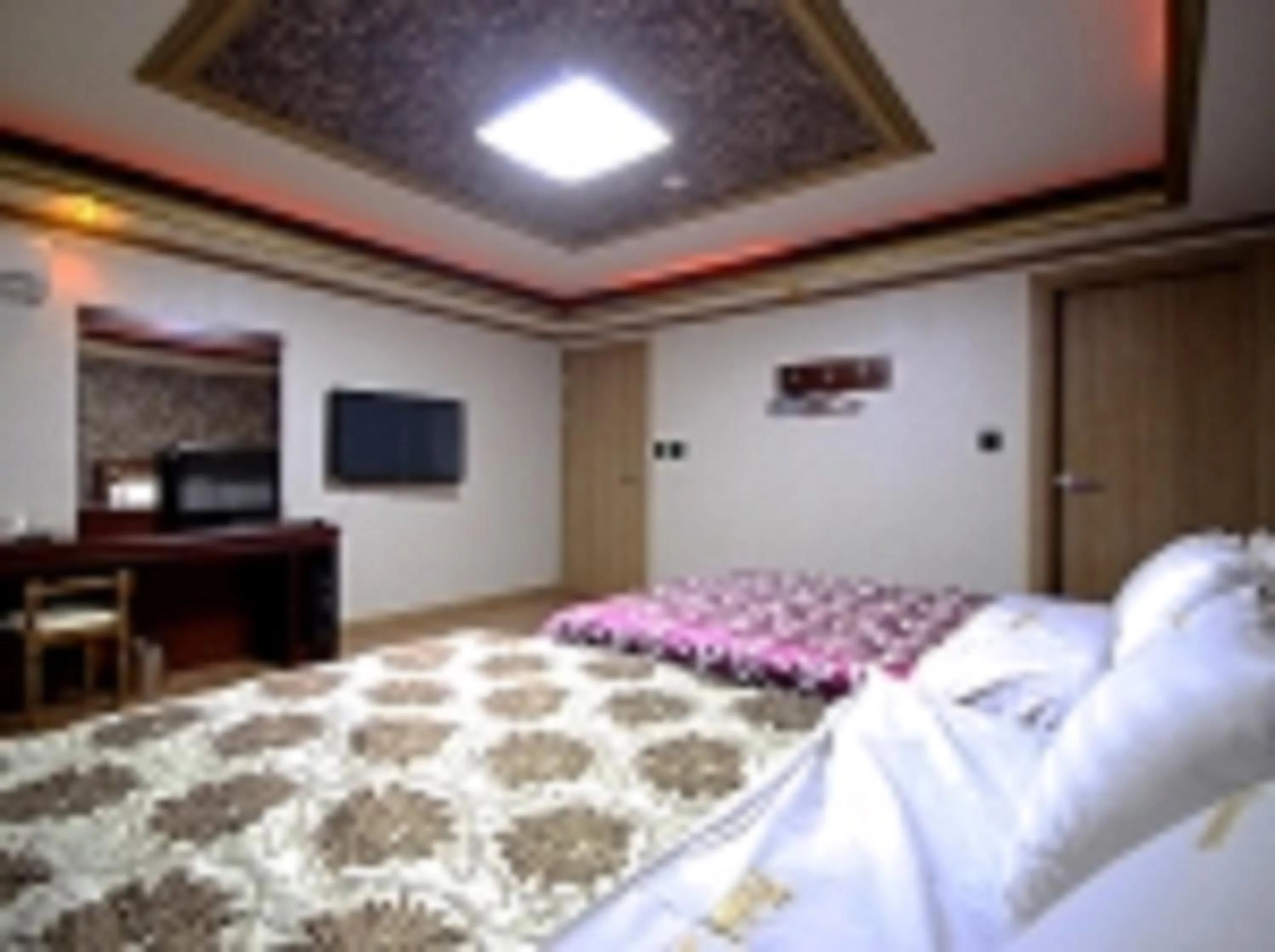 Bed in GuangJu Hotel Banana