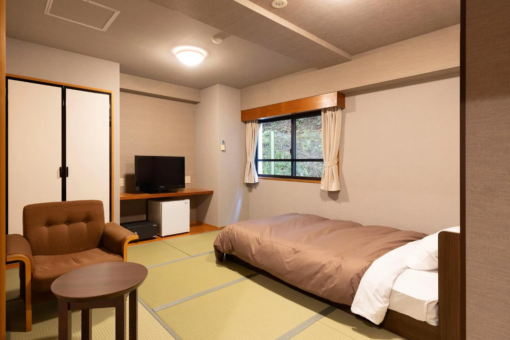 Photo of the whole room, Bed in Ooedo Onsen Monogatari Premium Gero Honkan