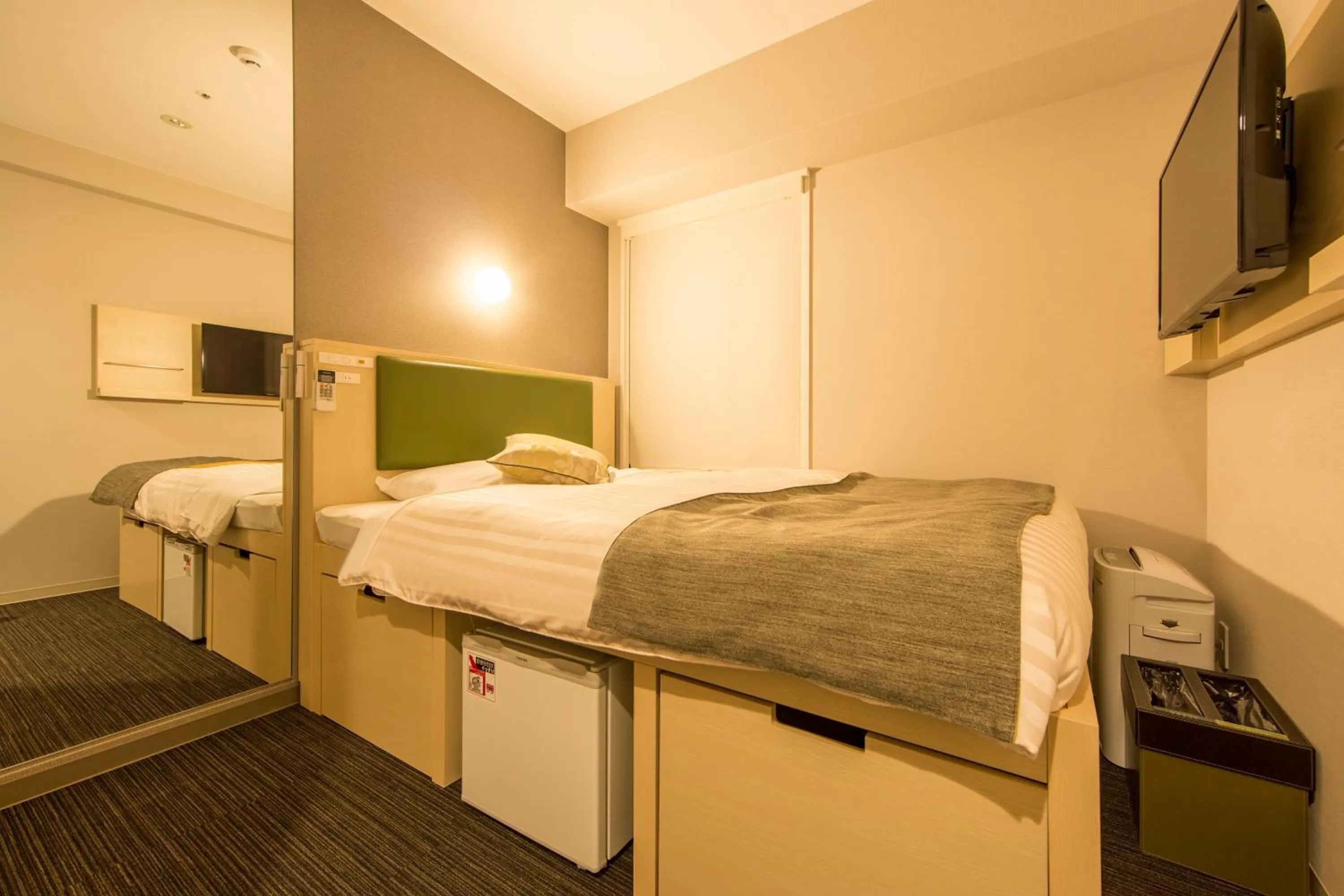 Bed in Super Hotel Premier Osaka Honmachi Ekimae Natural Hot Springs