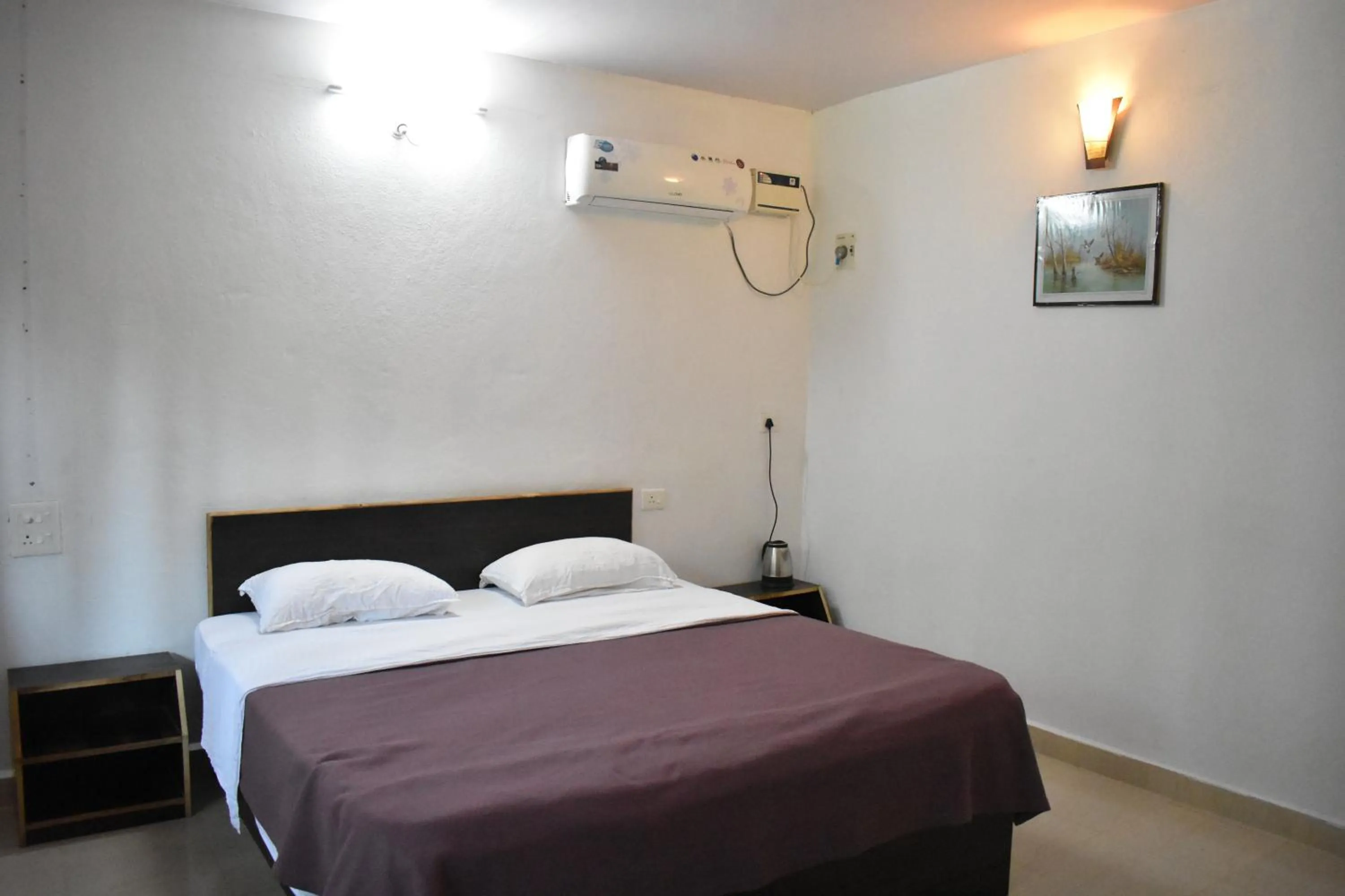 Bed in Club Palolem Resort