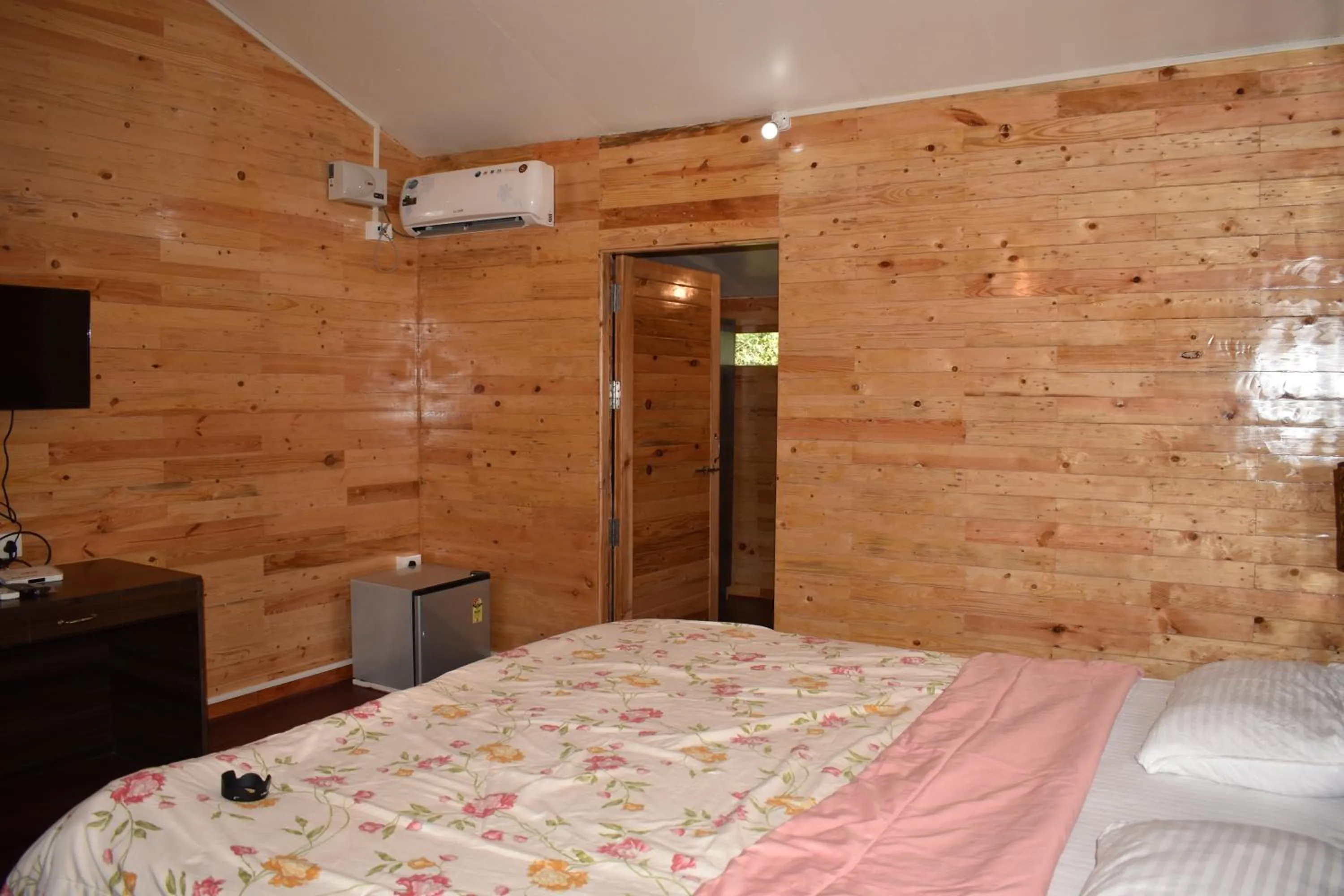 Bed in Club Palolem Resort