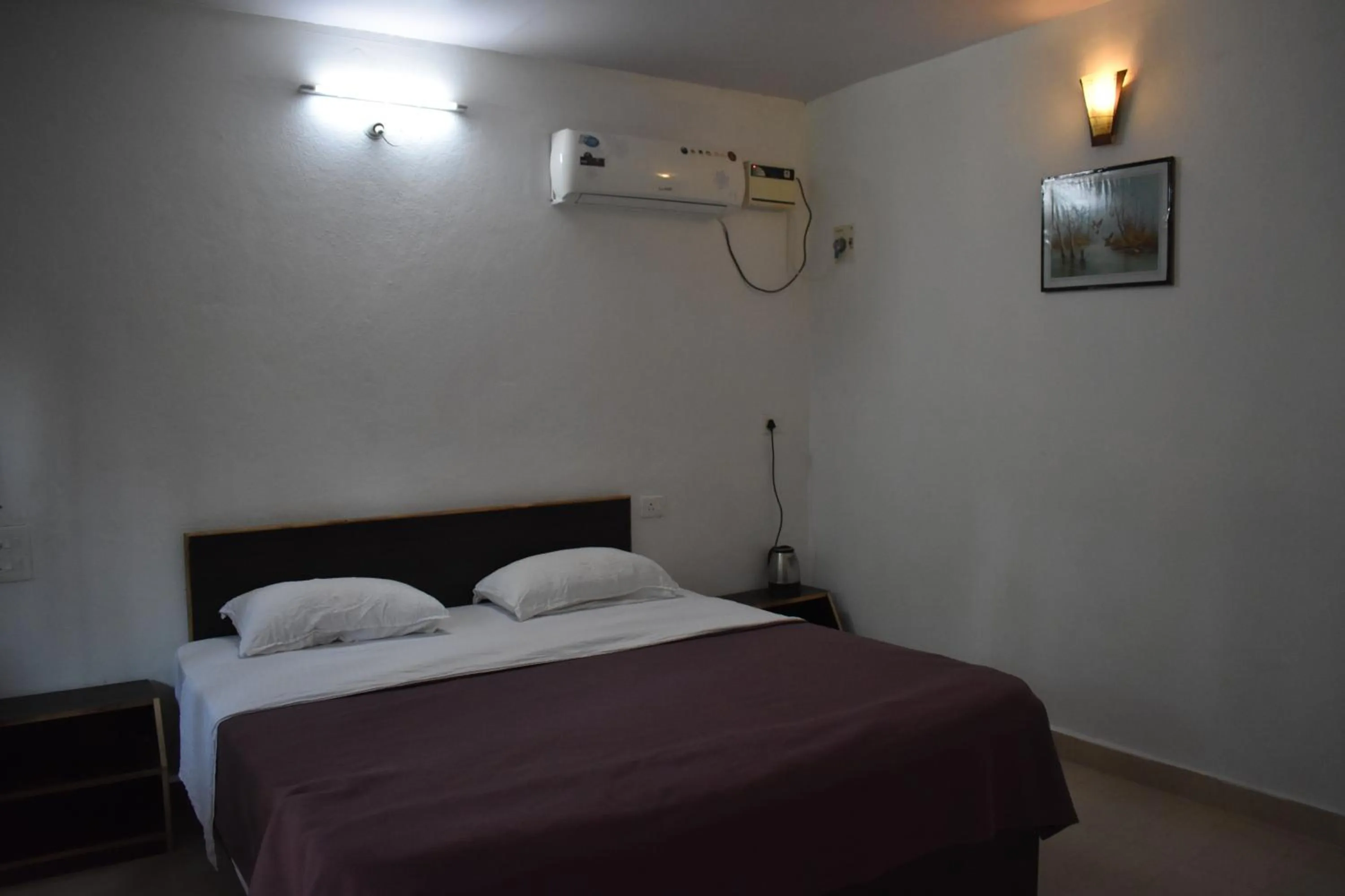 Bed in Club Palolem Resort