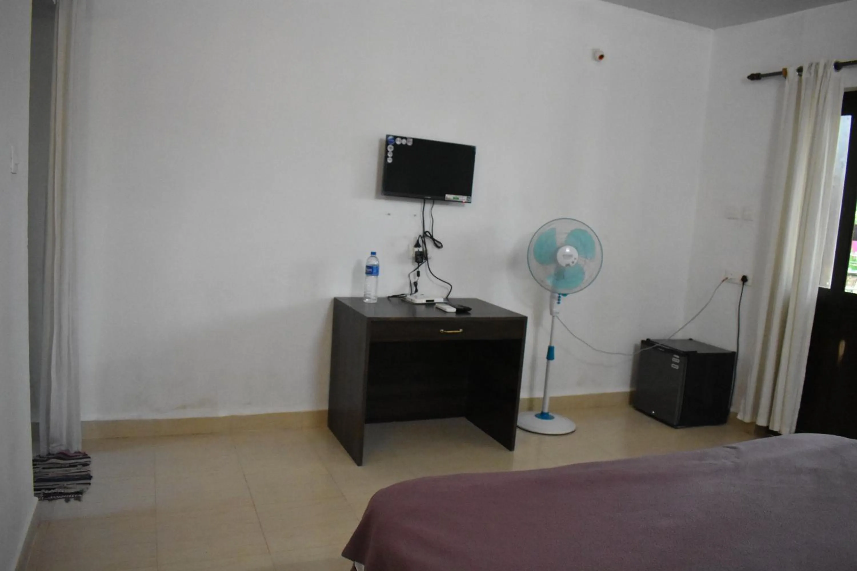 Bed in Club Palolem Resort