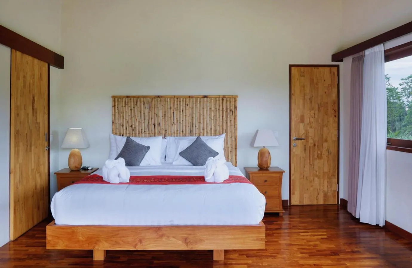 Bed in Desa Di Bali Villas