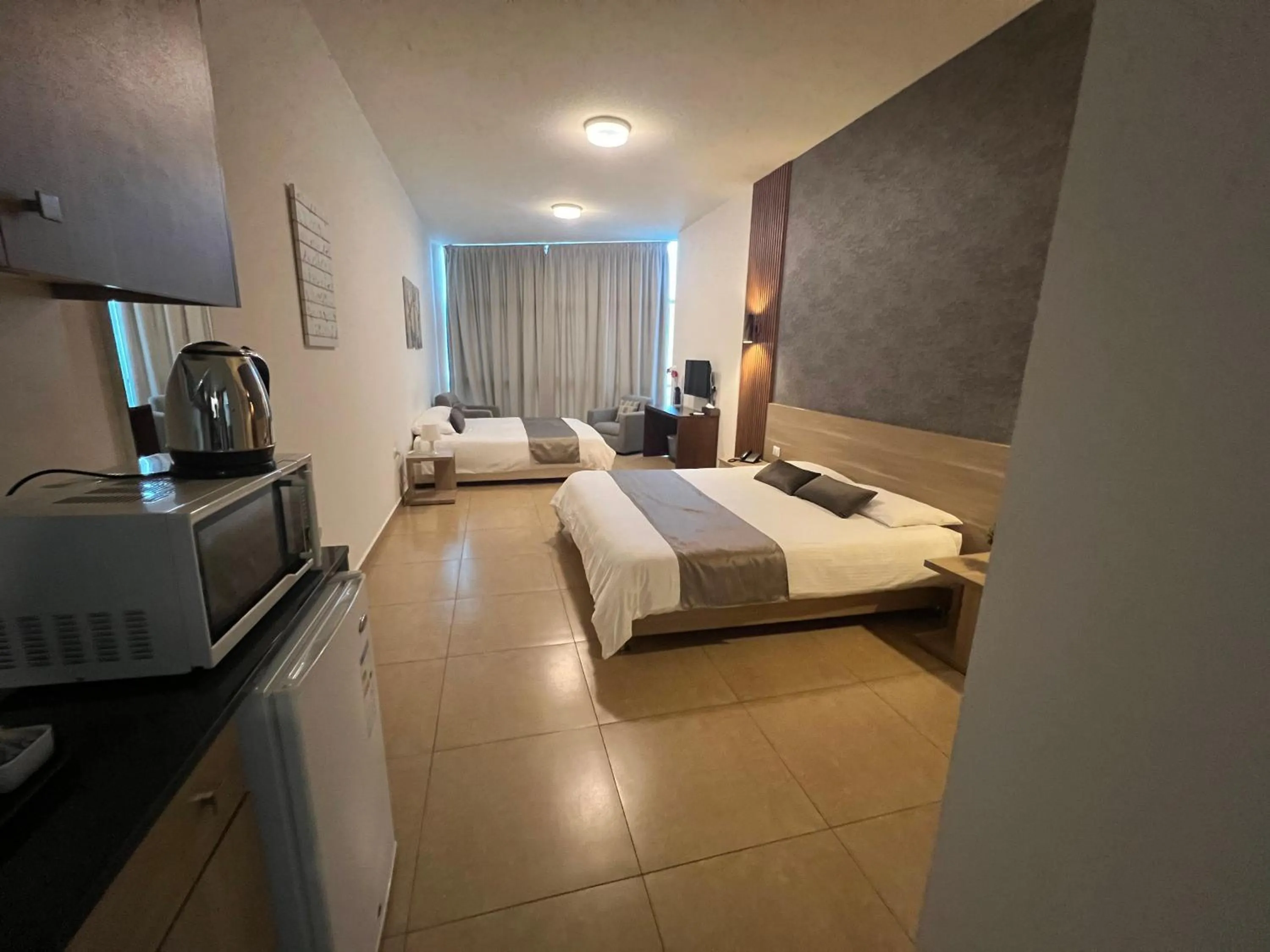 Bed in Byblostar Hotel