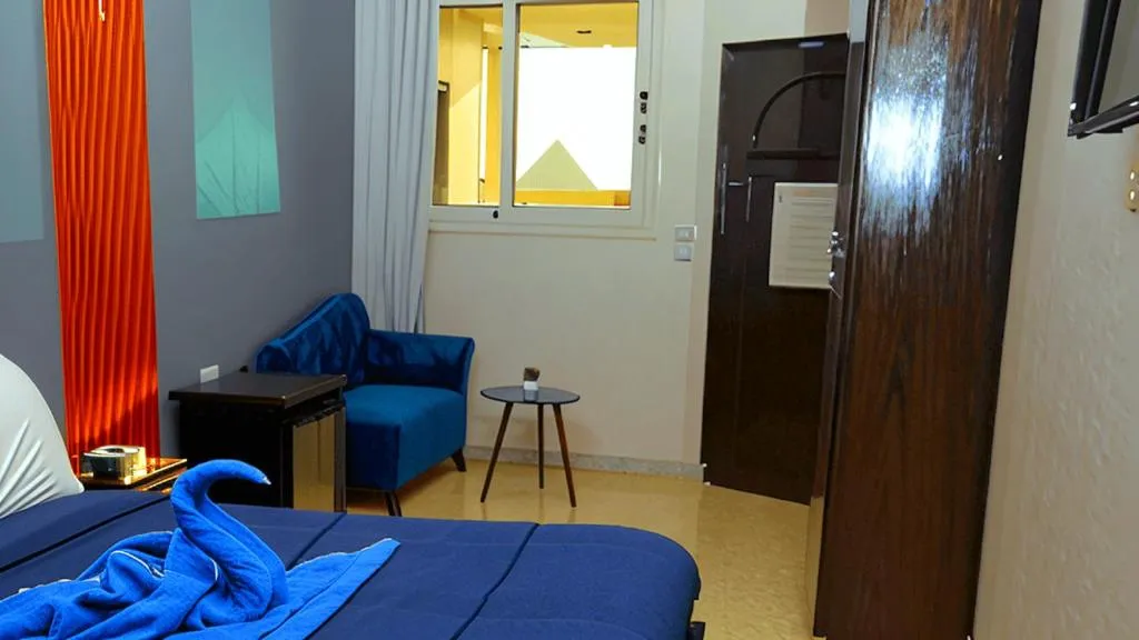 Bed in Horus Guest House Pyramids View