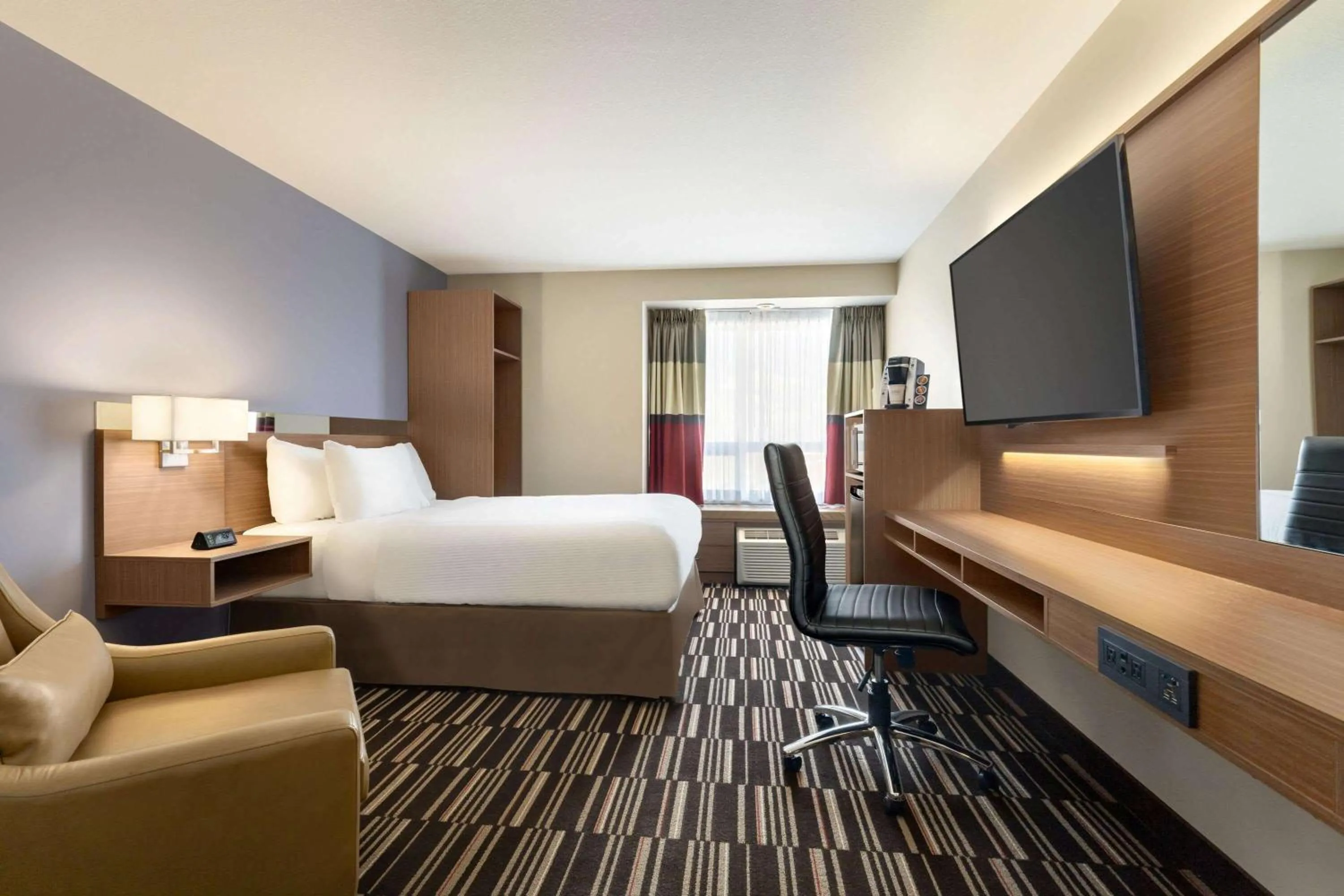 Photo of the whole room, Bed in Microtel Inn & Suites by Wyndham Bonnyville