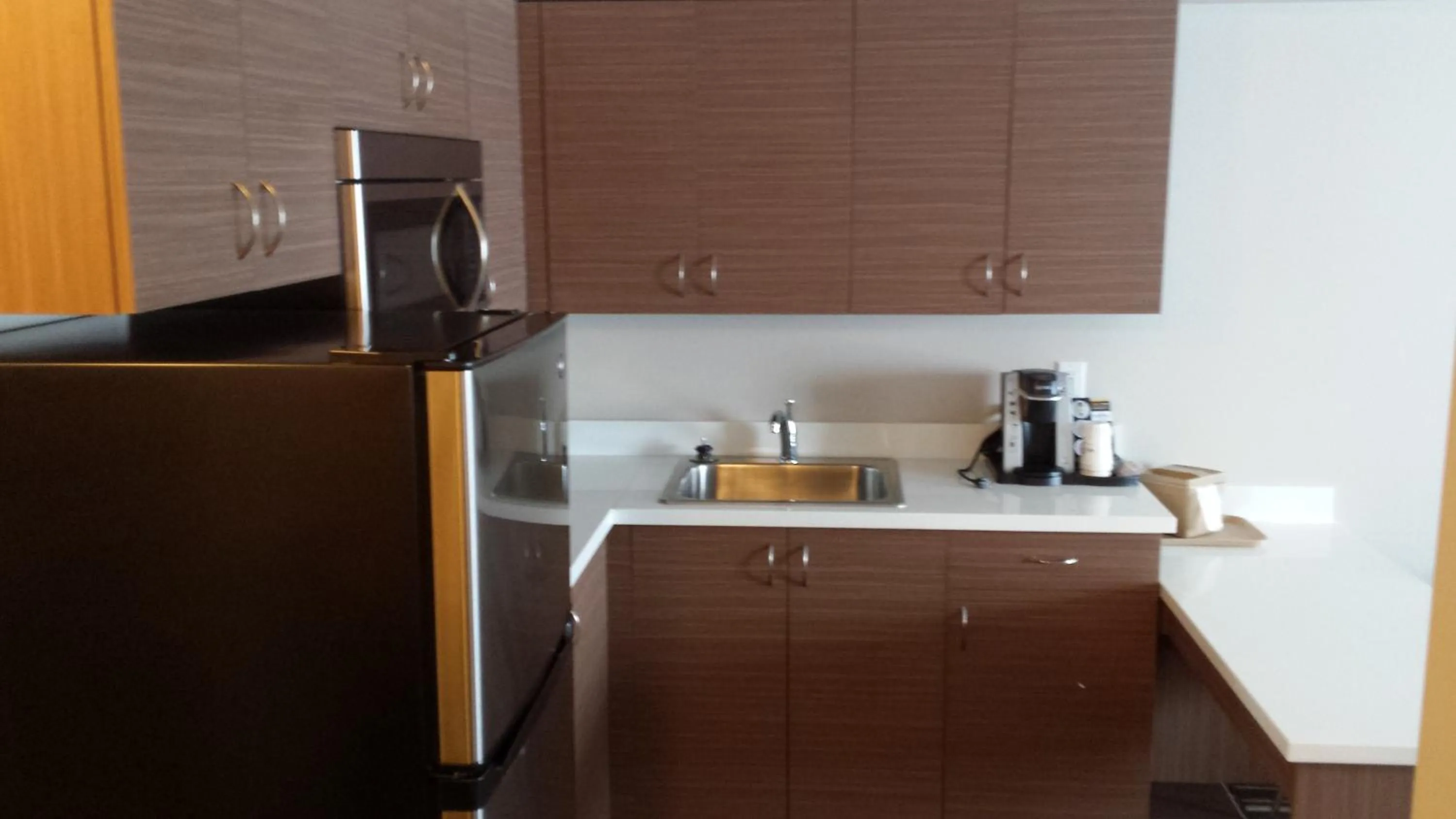 Kitchen or kitchenette in Microtel Inn & Suites by Wyndham Bonnyville