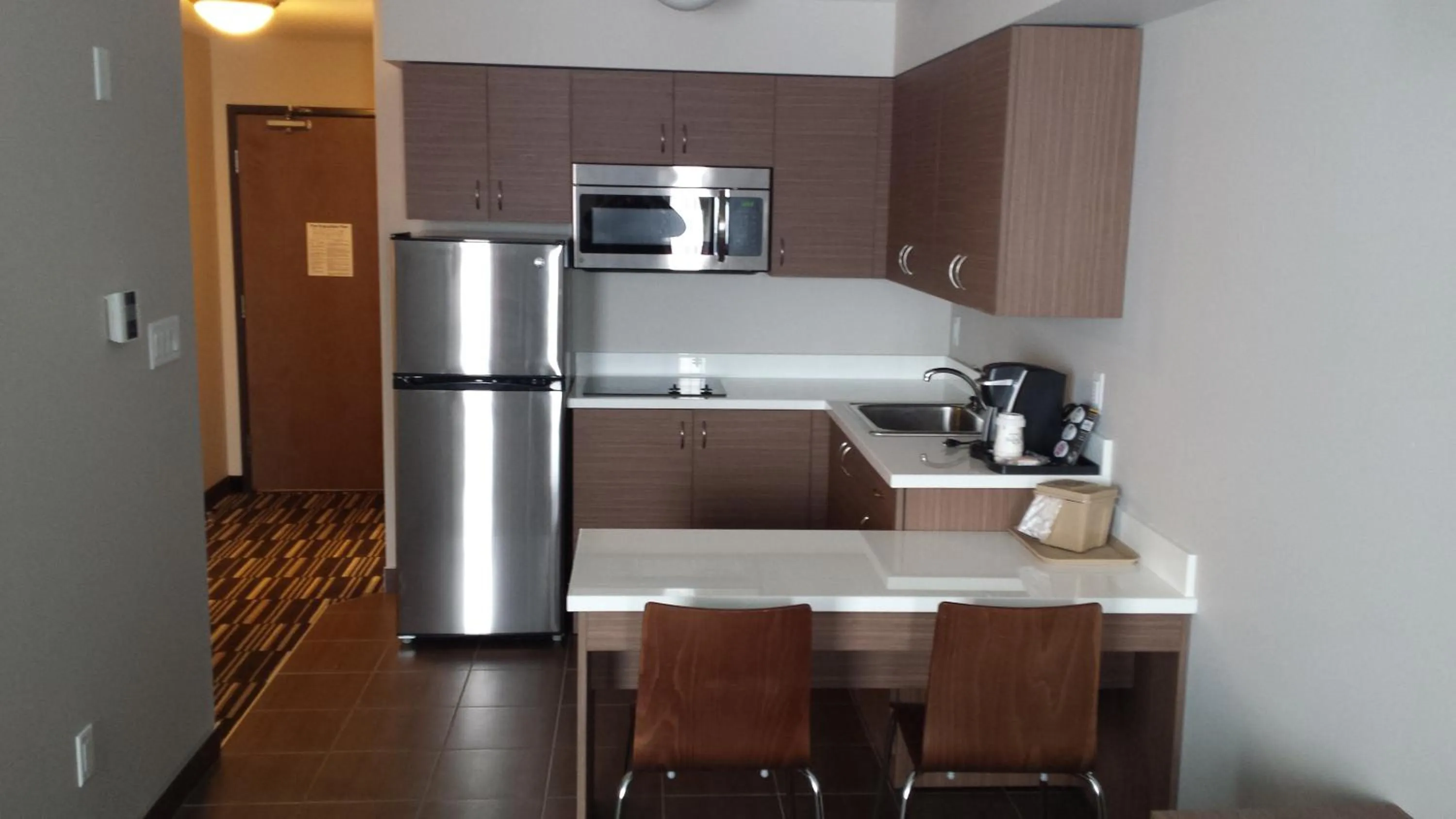 Kitchen or kitchenette in Microtel Inn & Suites by Wyndham Bonnyville