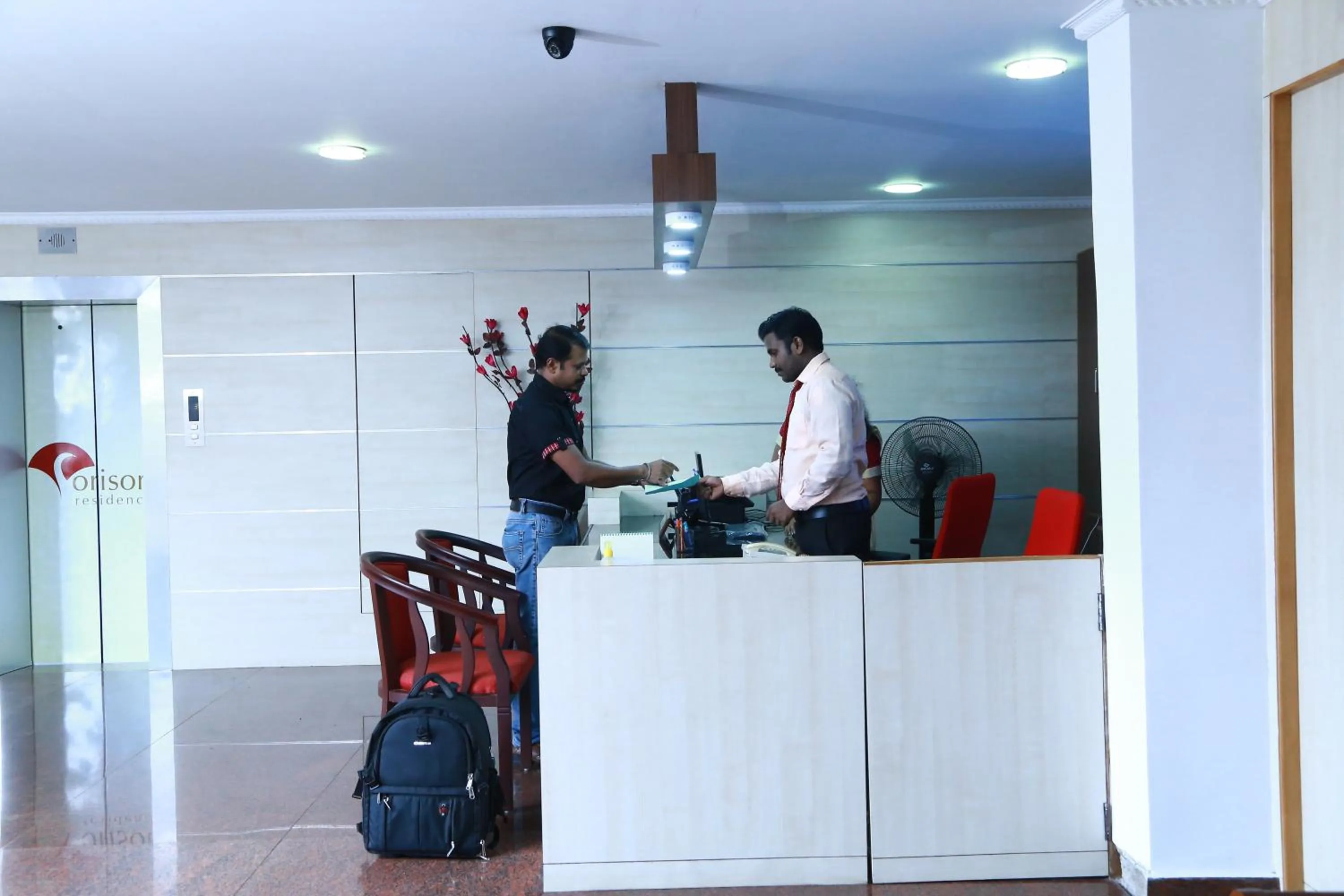 Staff in Orison Residency Hotel