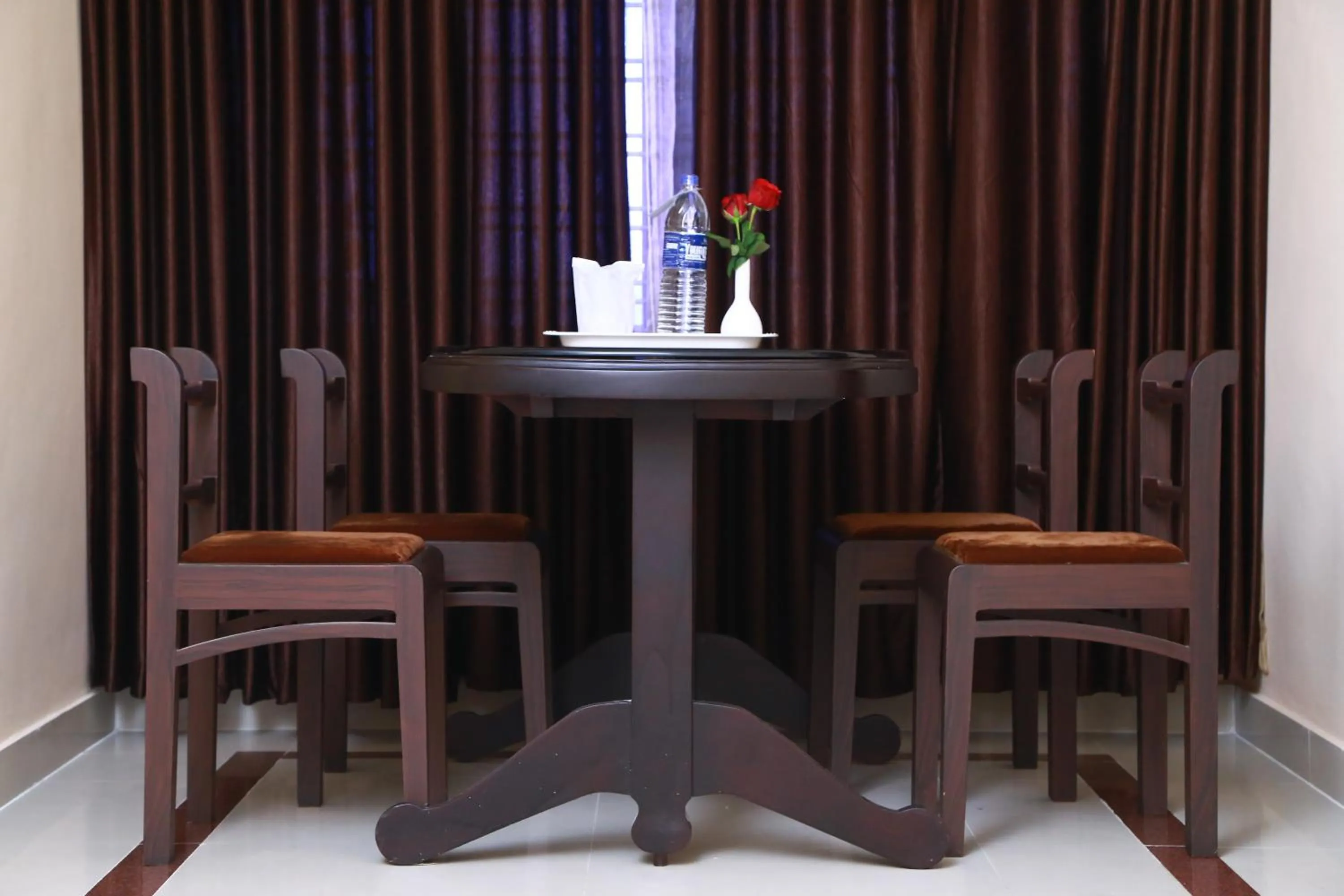 Dining area in Orison Residency Hotel