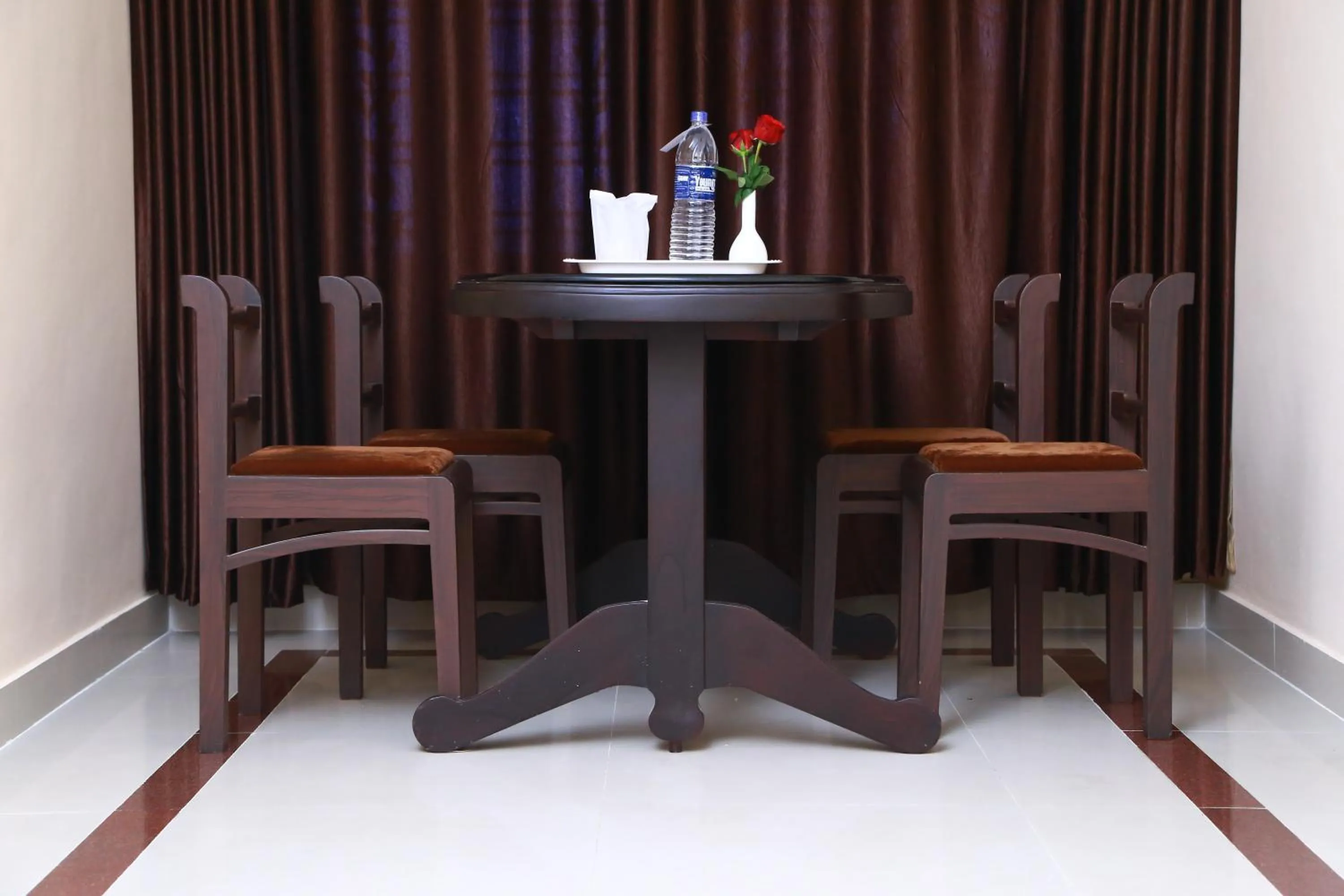 Dining area in Orison Residency Hotel