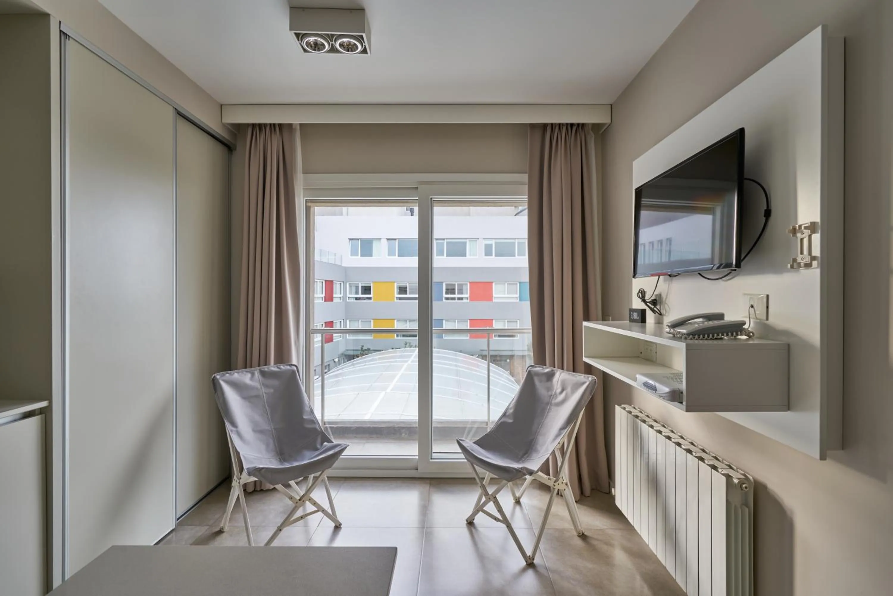 TV and multimedia in Almarena Apart & Hotel Boutique