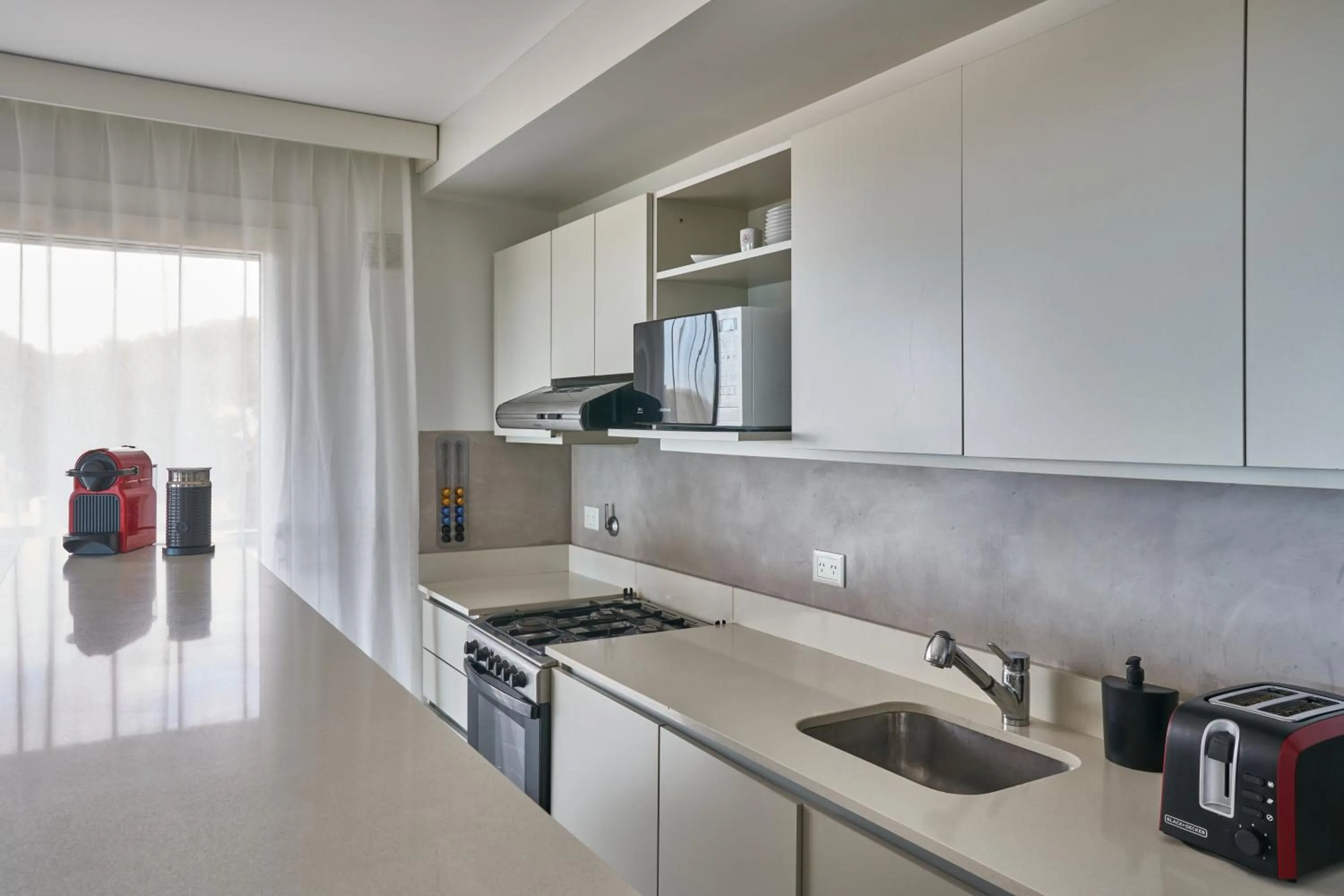 Kitchen or kitchenette in Almarena Apart & Hotel Boutique