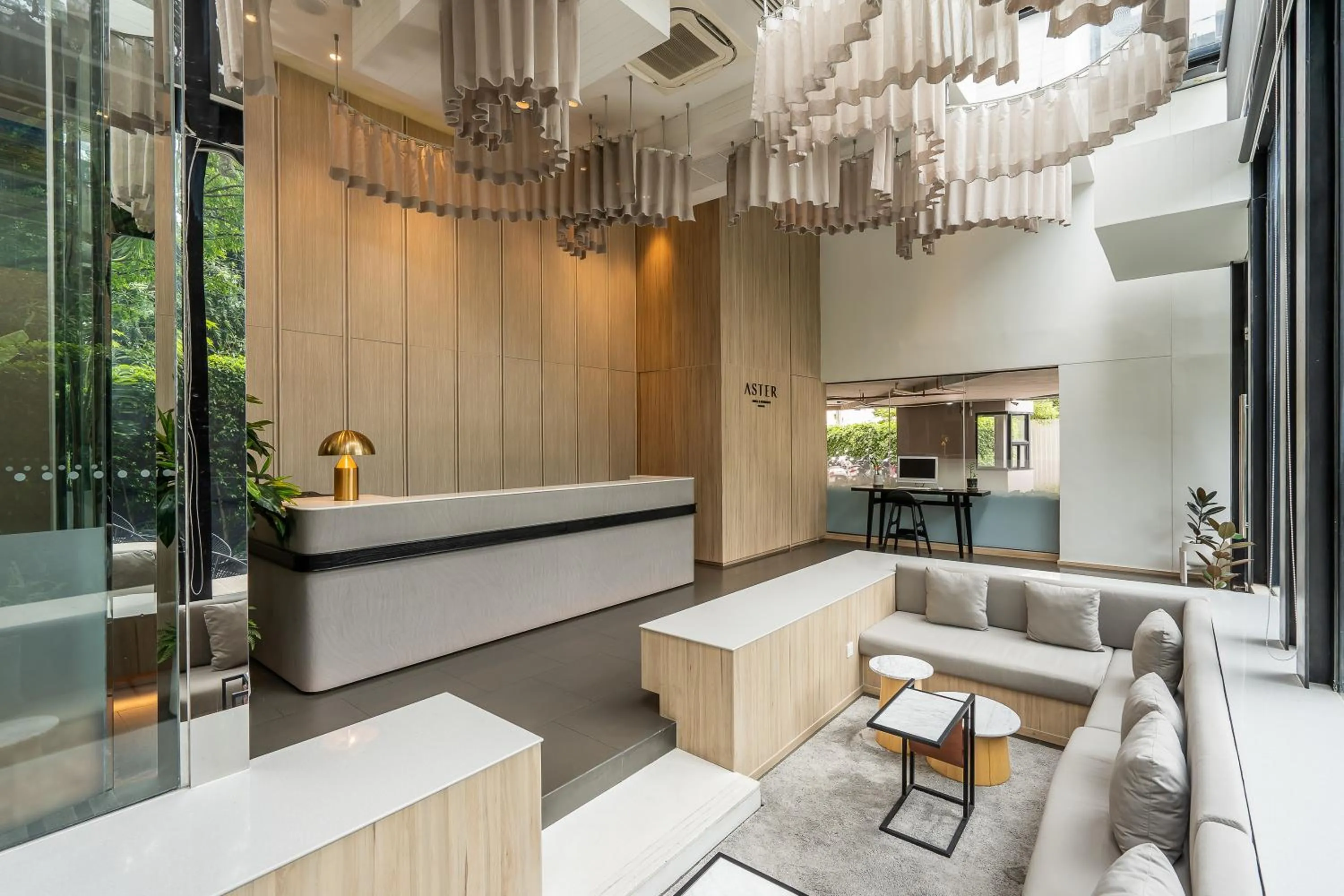 Lobby or reception in Aster Hotel and Residence by At Mind