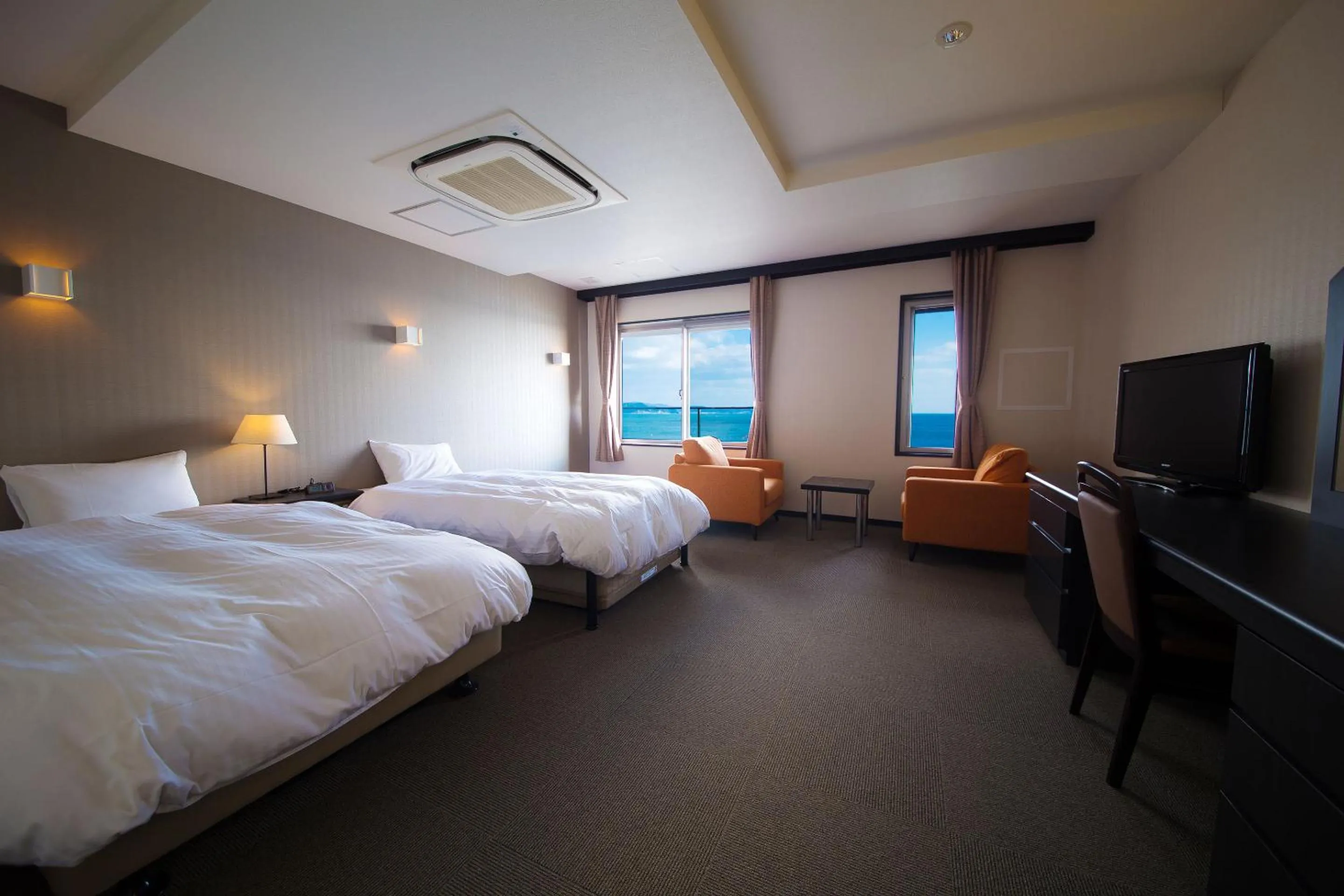 Photo of the whole room, Bed in Seaside Hotel Taimaru Kaigetsu