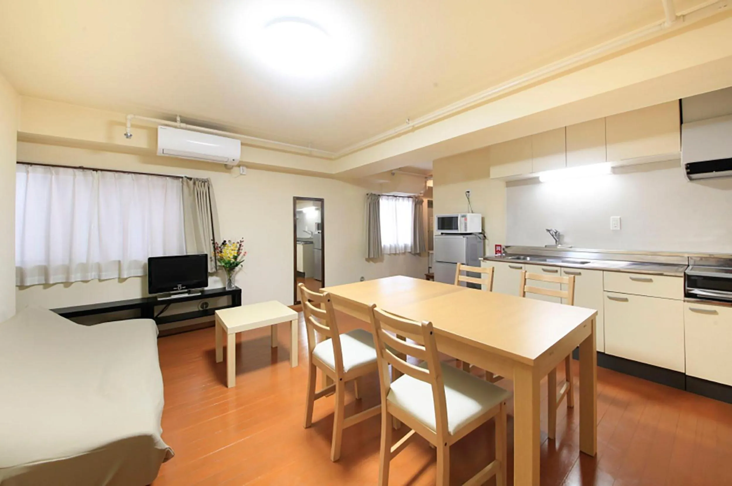 Kitchen or kitchenette in Shinjuku Urban Hotel