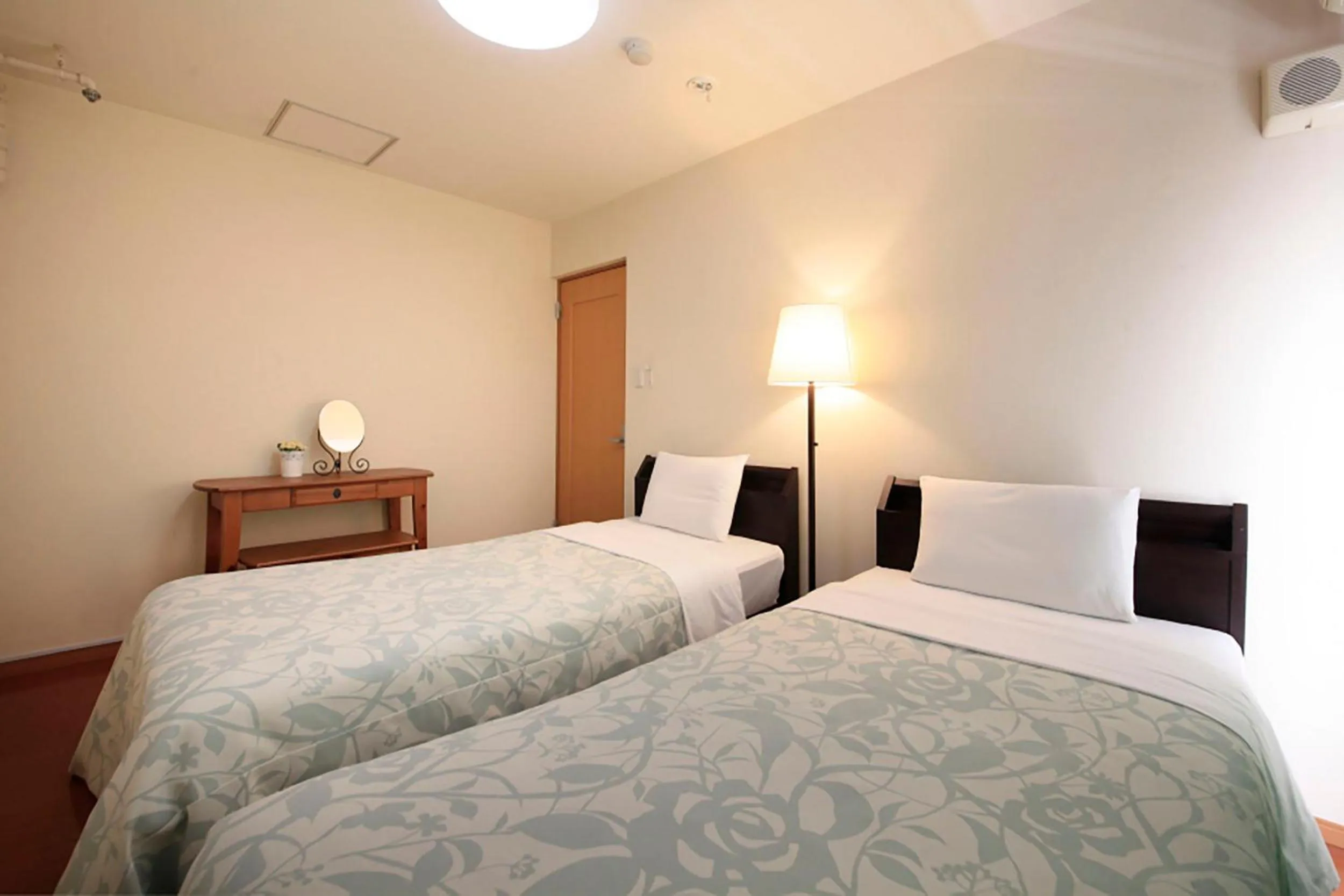 Bed in Shinjuku Urban Hotel