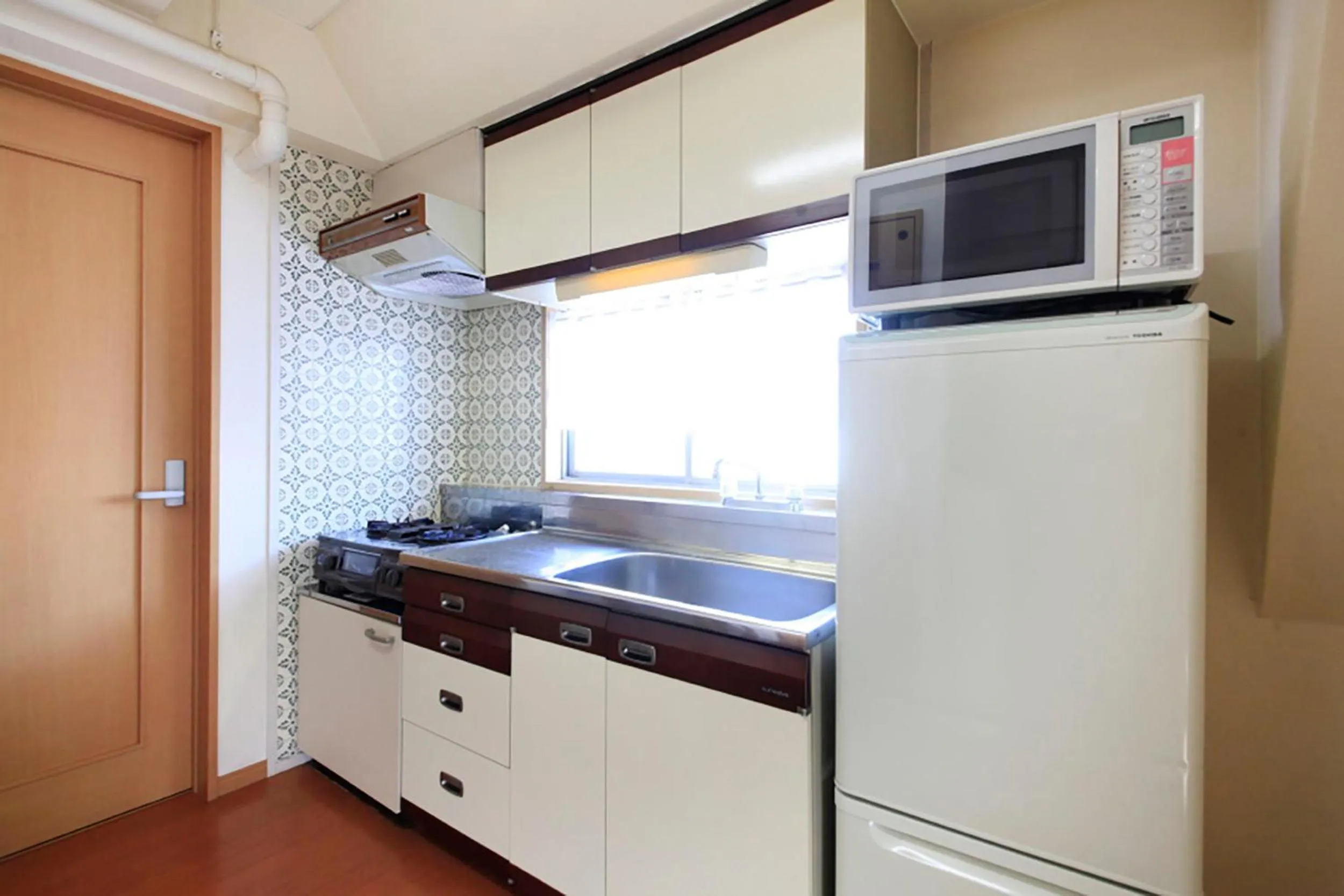 Kitchen or kitchenette in Shinjuku Urban Hotel