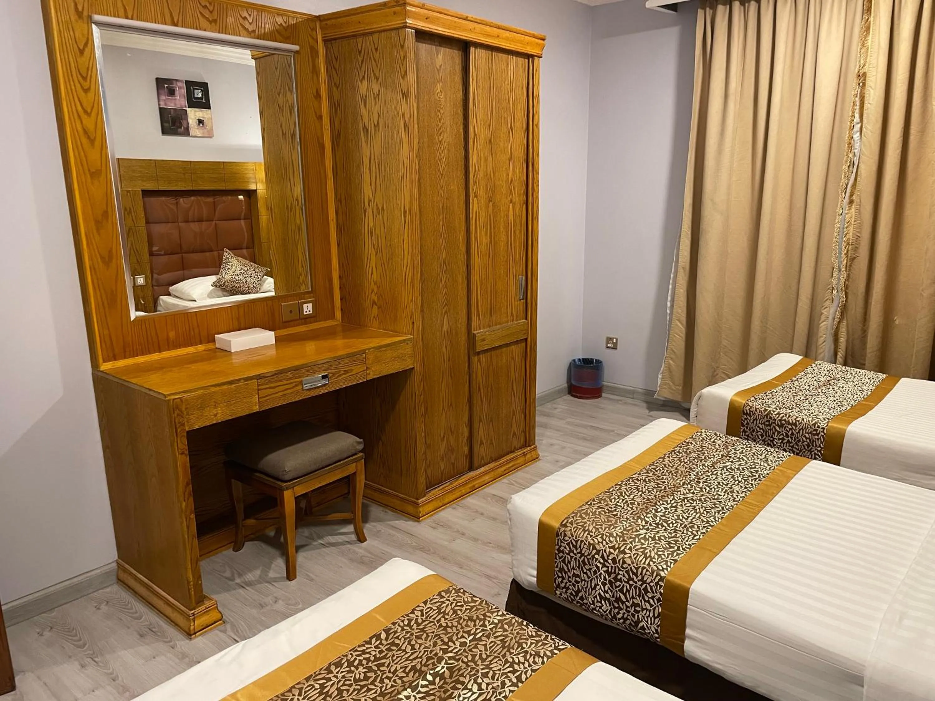 Bedroom, Bed in Travellerinn Serviced Apartment