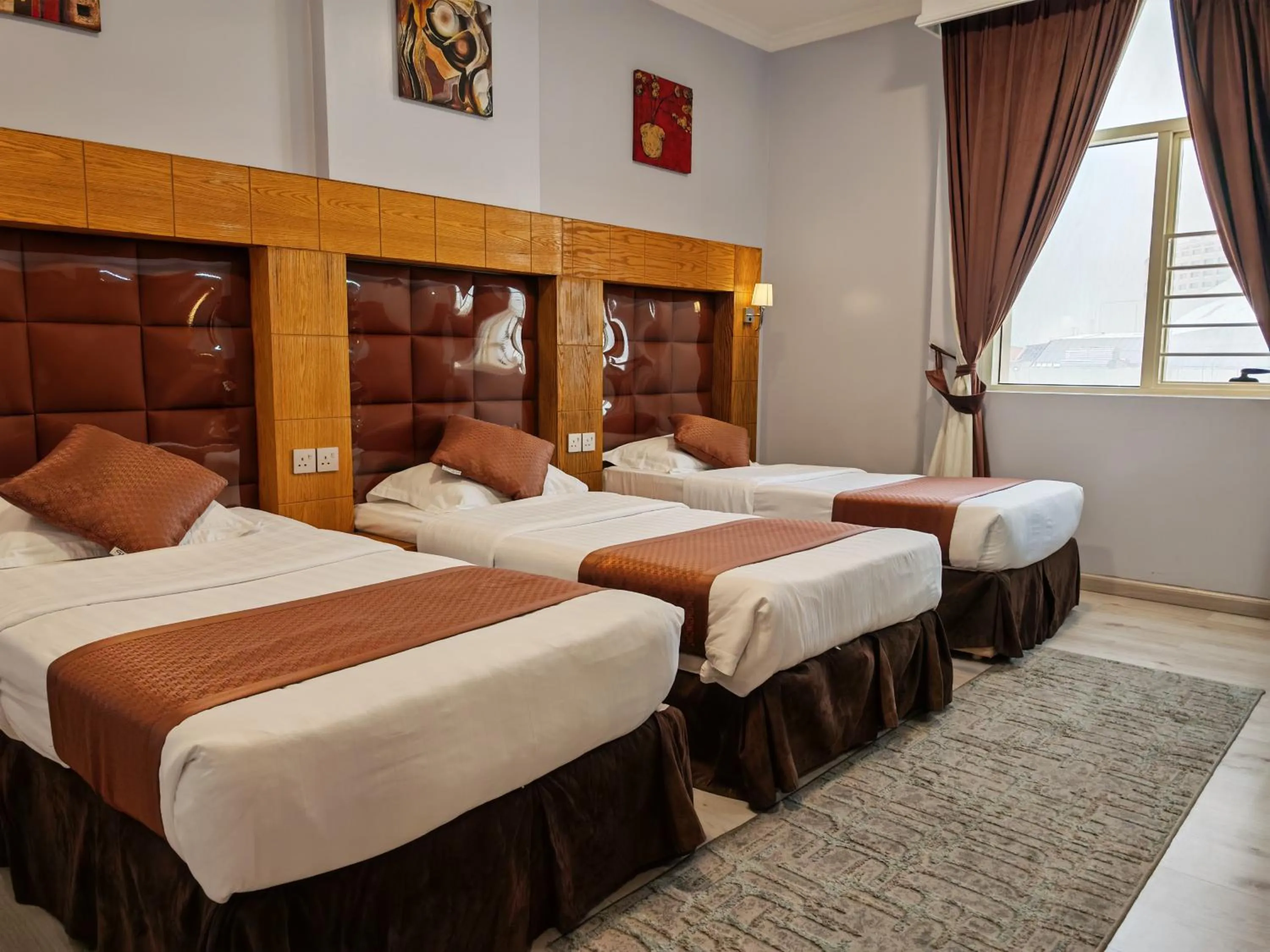 Bedroom, Bed in Travellerinn Serviced Apartment