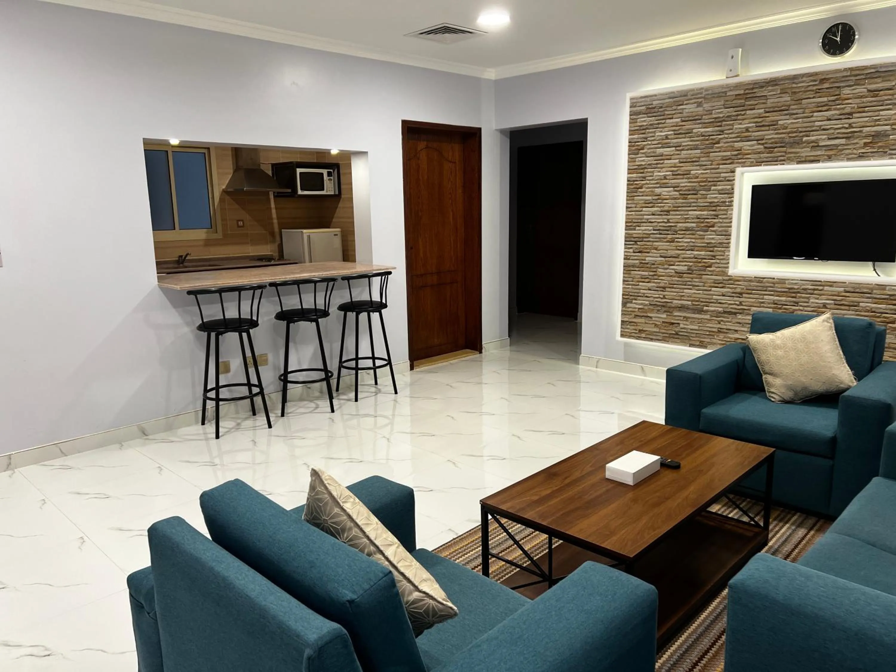 Living room in Travellerinn Serviced Apartment