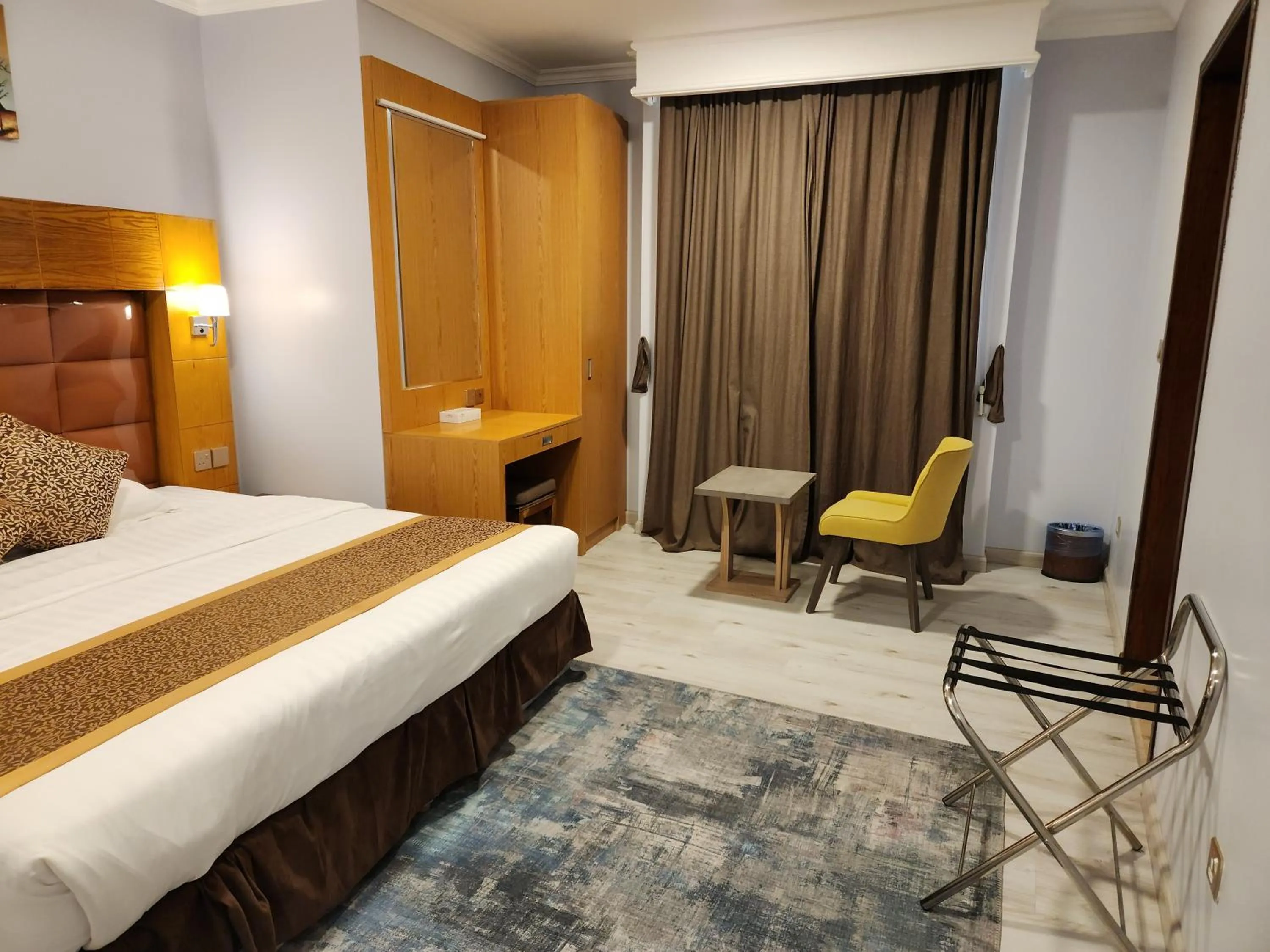 Bed in Travellerinn Serviced Apartment