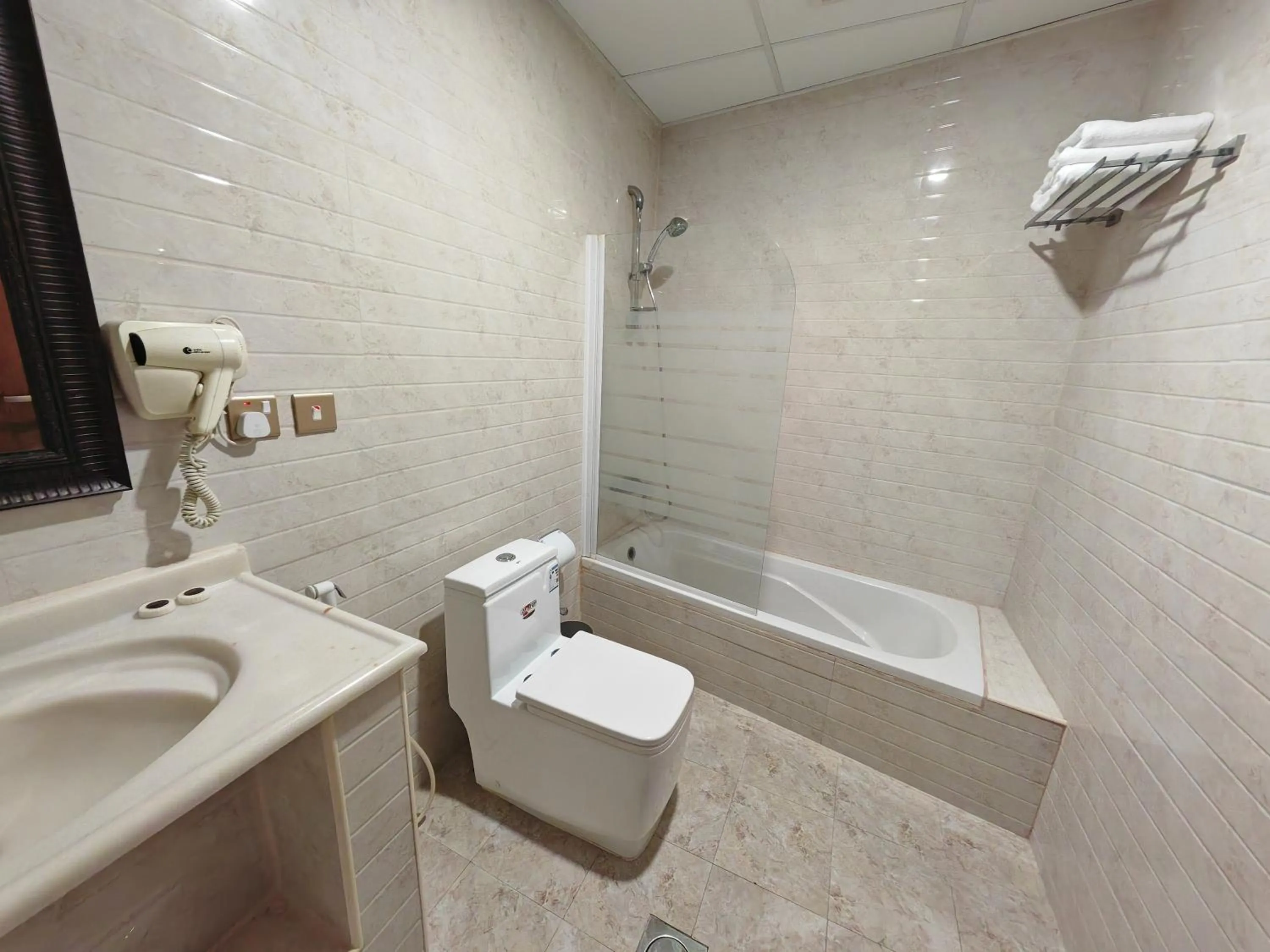 Bathroom in Travellerinn Serviced Apartment
