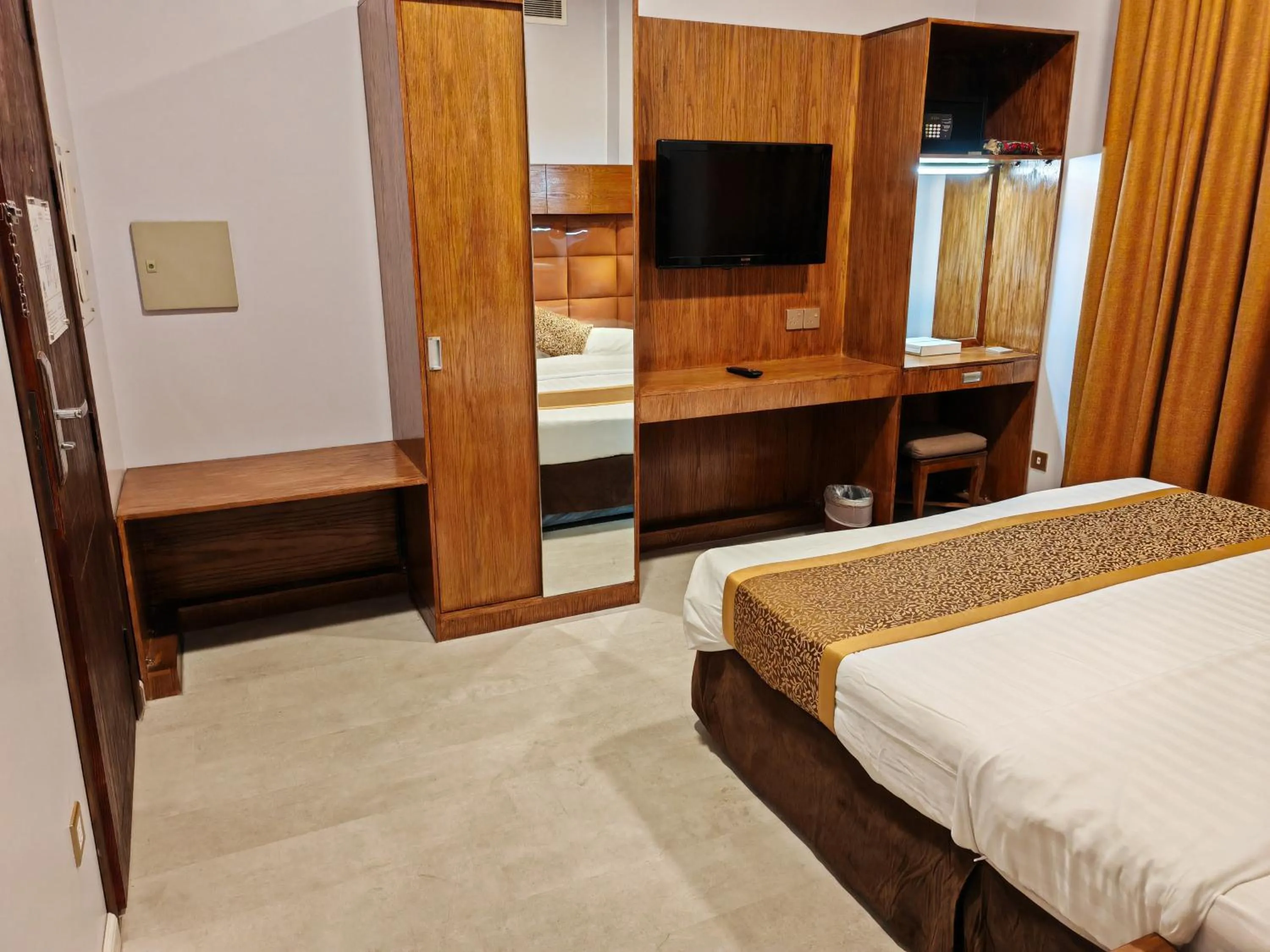 Bedroom, Bed in Travellerinn Serviced Apartment