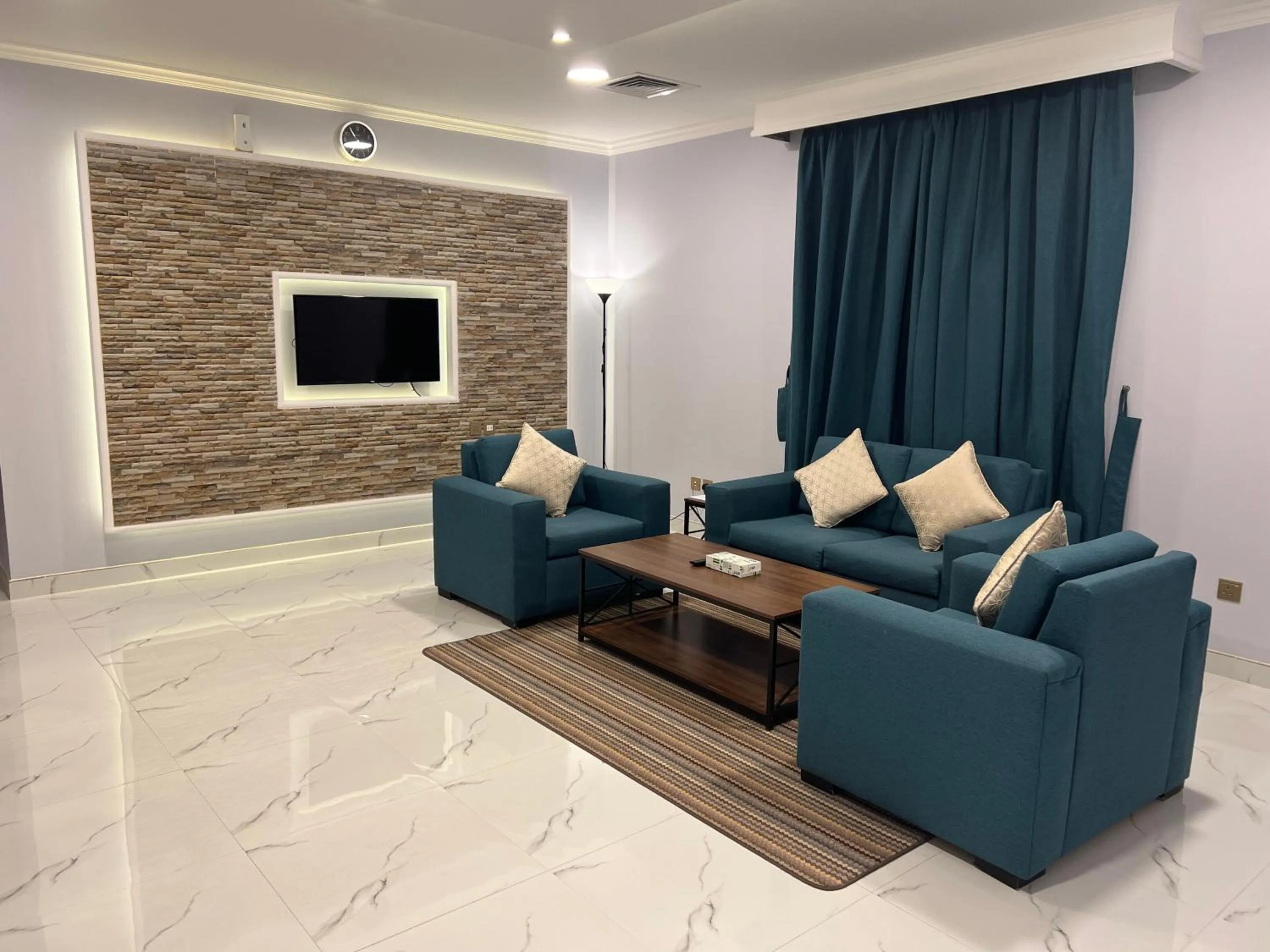 Living room in Travellerinn Serviced Apartment