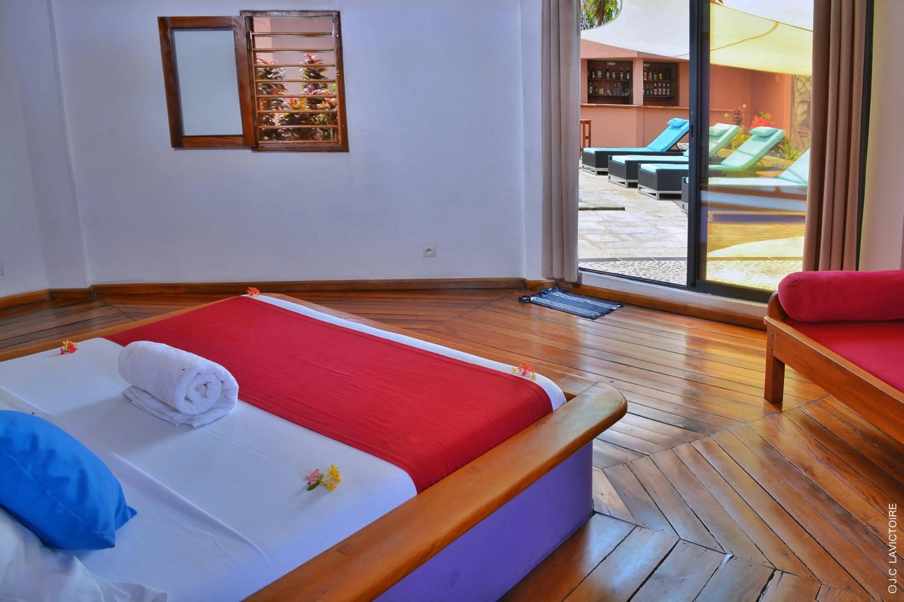 Bed in Hôtel Sarimanok