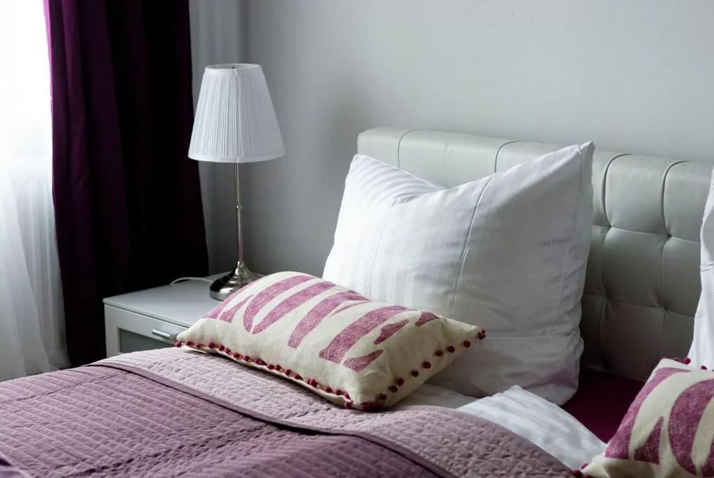Decorative detail, Bed in Grand Central Mitte Apartment