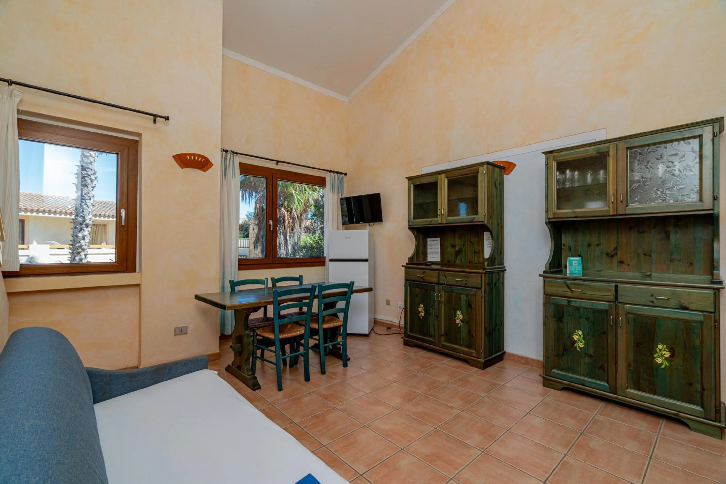 Dining area in Club Esse Residence Capo D'orso
