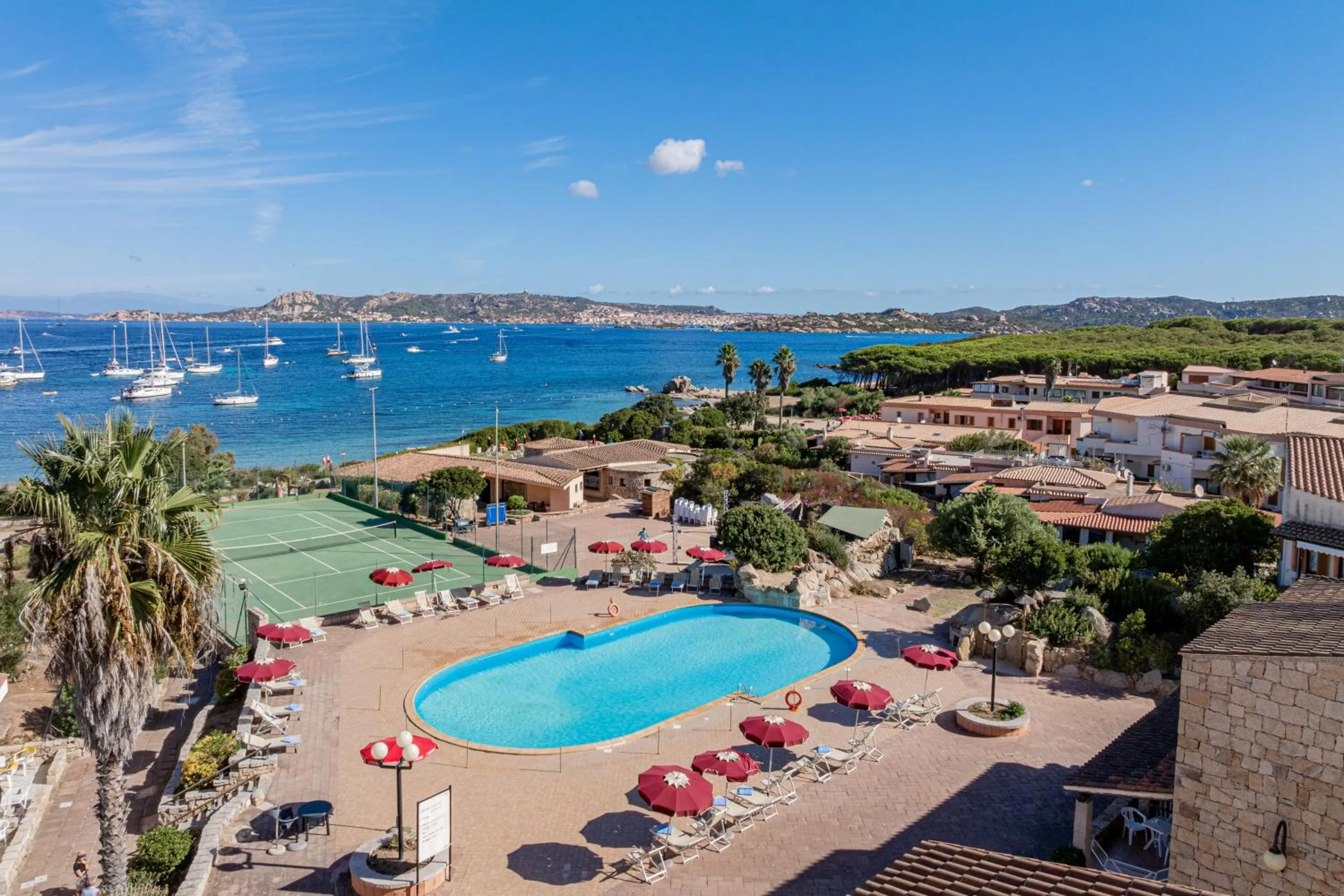 Swimming pool in Club Esse Residence Capo D'orso
