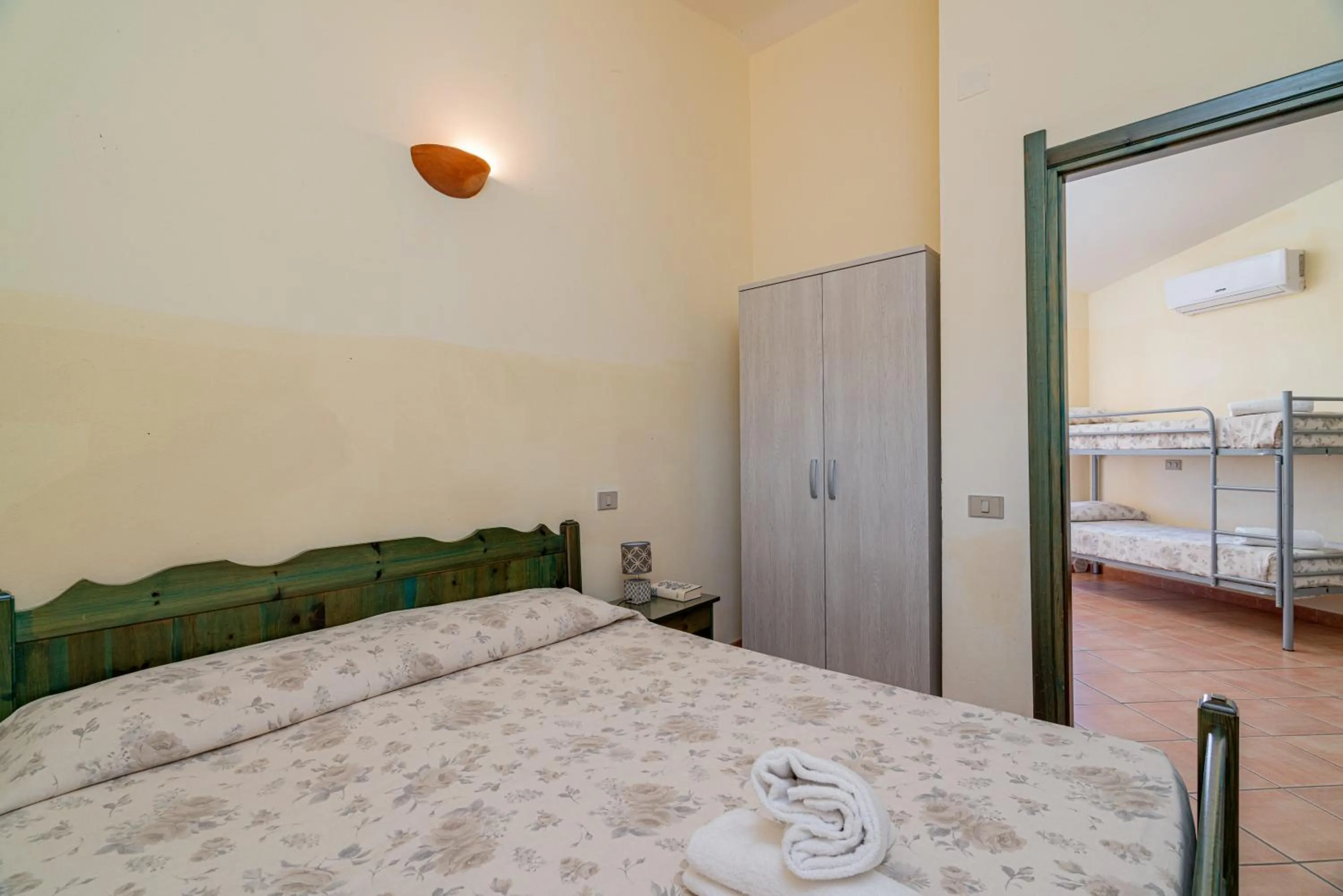 Bed in Club Esse Residence Capo D'orso