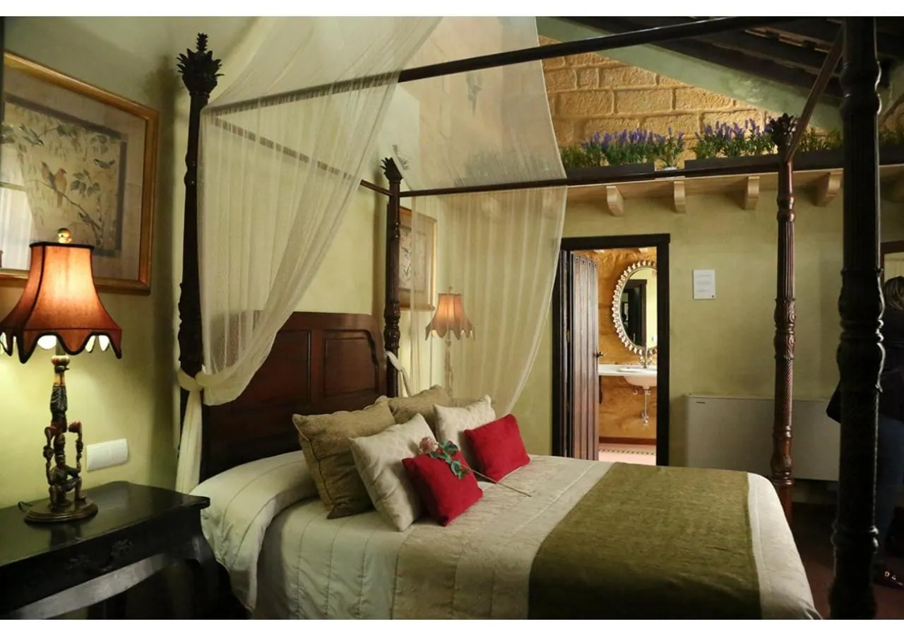 Bed in La Casona de Calderón Gastronomic & Boutique Hotel