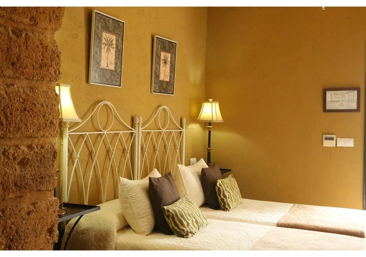 Decorative detail, Bed in La Casona de Calderón Gastronomic & Boutique Hotel