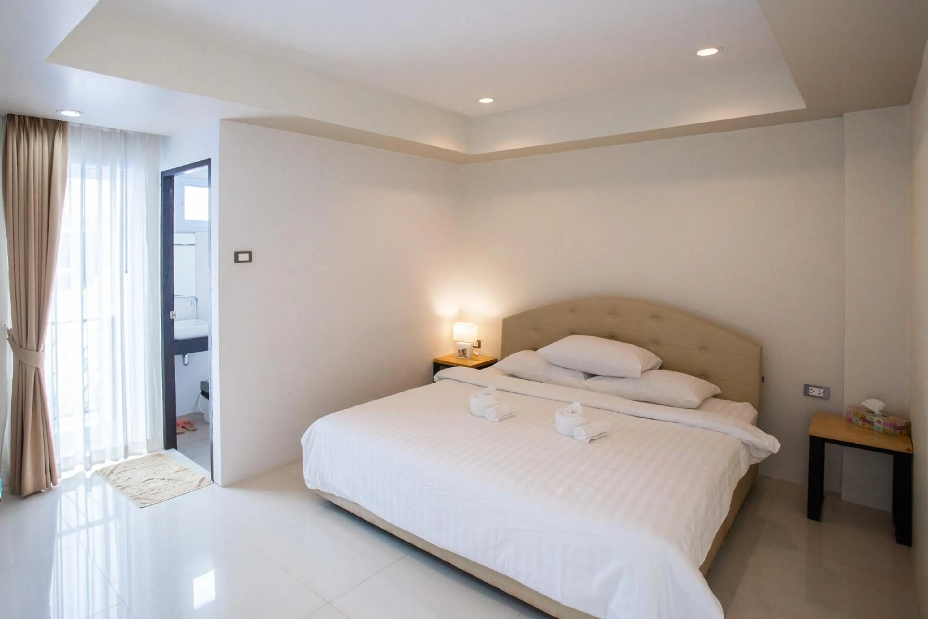 Bed in Le Neuf Nakorn Lampang