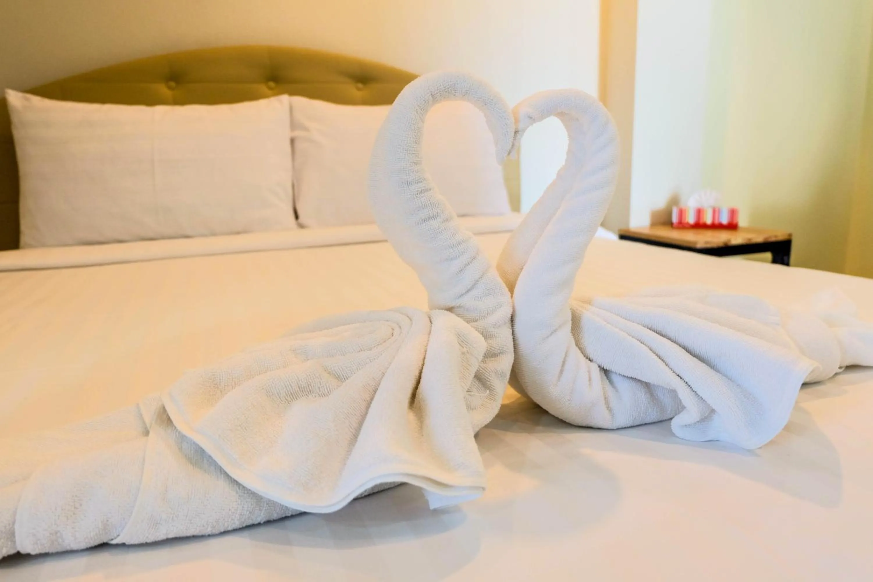 Bed in Le Neuf Nakorn Lampang