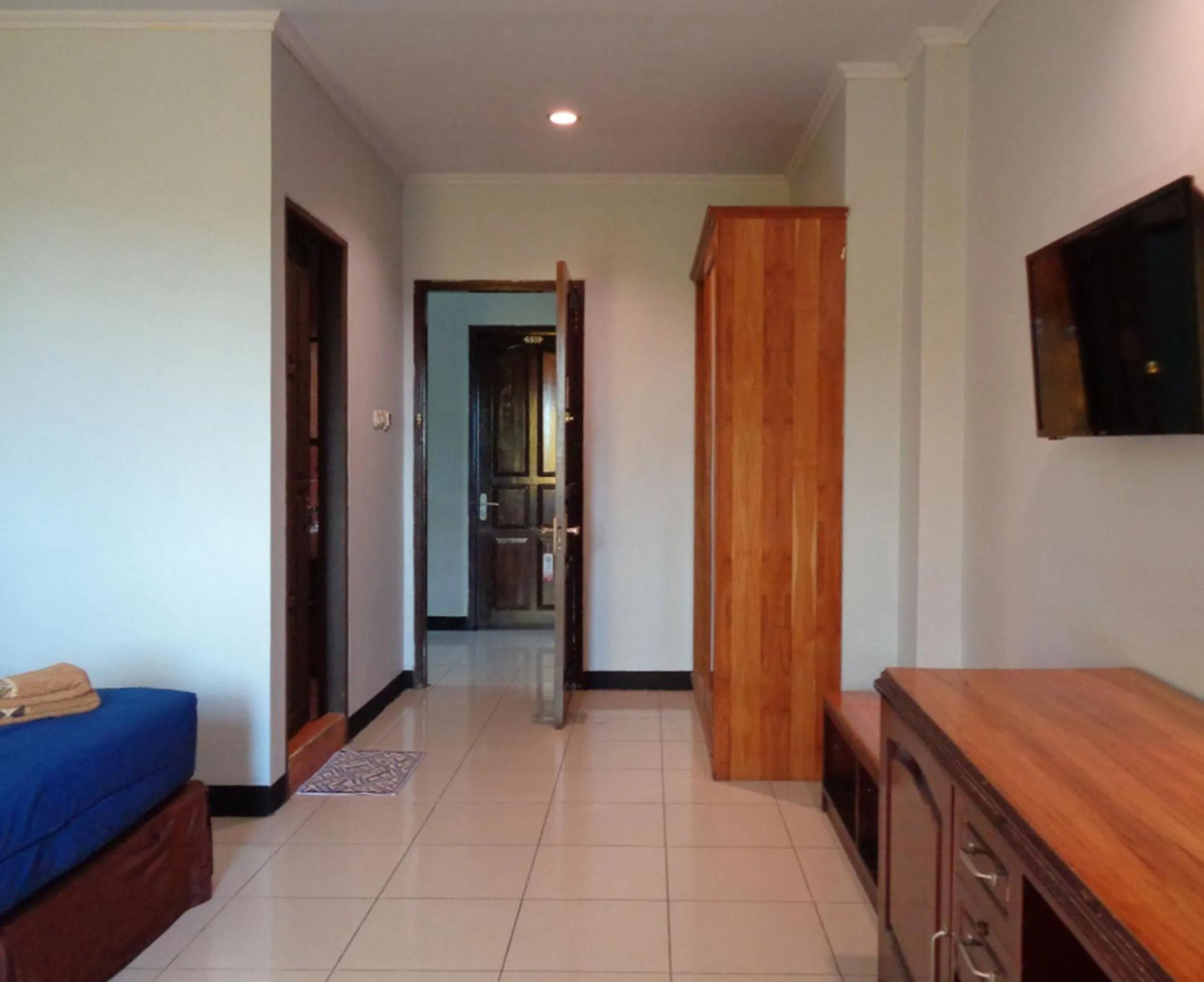 Bedroom, Bed in RedDoorz Syariah at Grand Taufiq Tarakan